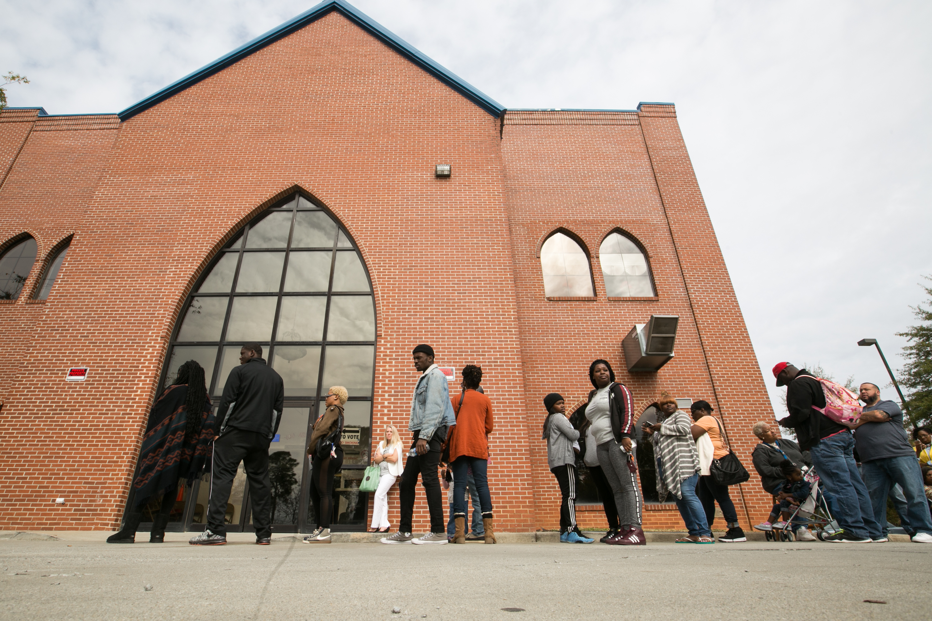 Voters line up outside Liberty Baptist Church to cast their ballot in the 2016 Presidential Election on November 8, 2016 in Atlanta, Georgia. CREDIT: Jessica McGowan/Getty Images