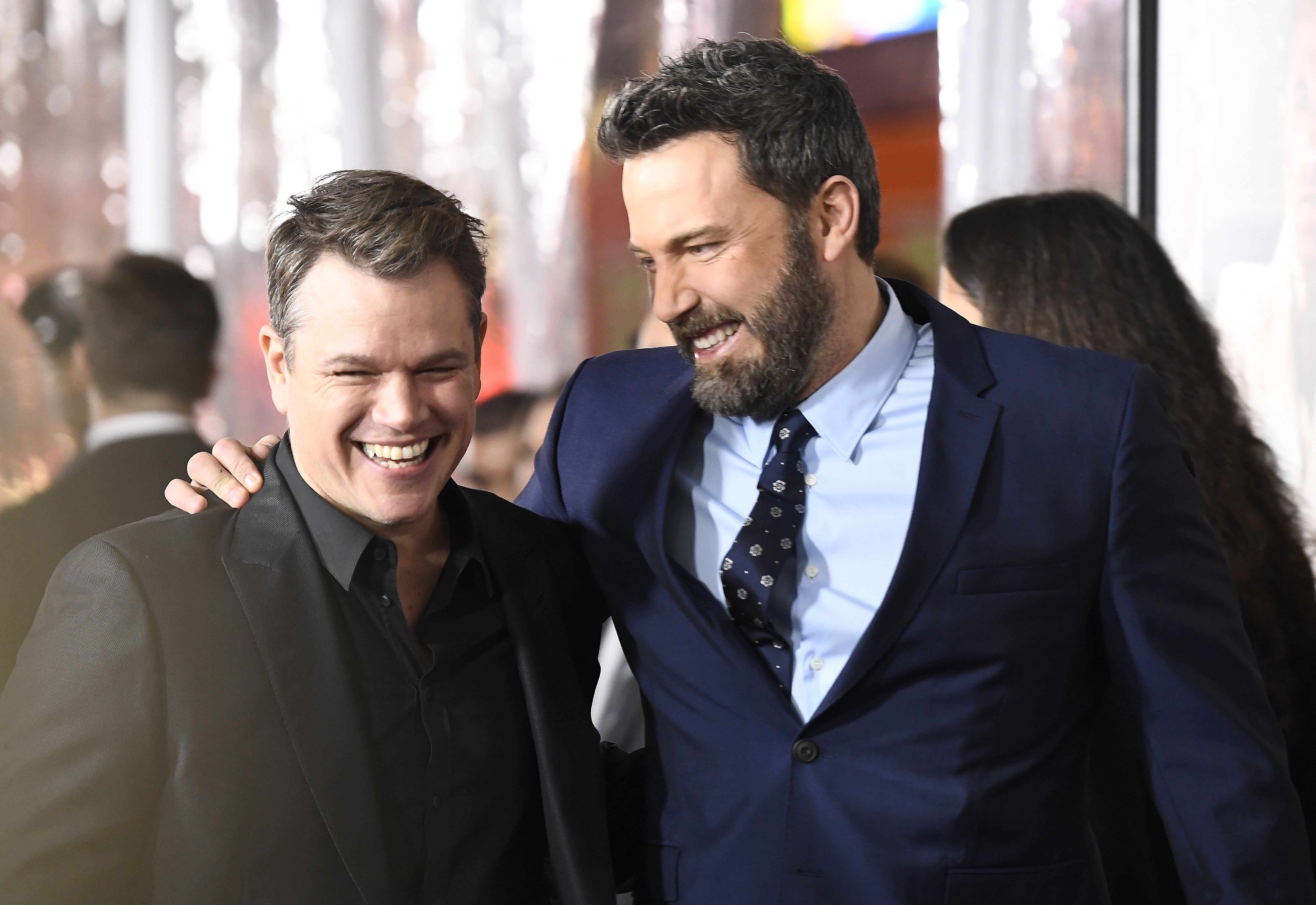 Matt Damon and Ben Affleck attend the premiere of Warner Bros. Pictures' "Live By Night" at TCL Chinese Theatre on January 9, 2017 in Hollywood, California. CREDIT: Frazer Harrison/Getty Images