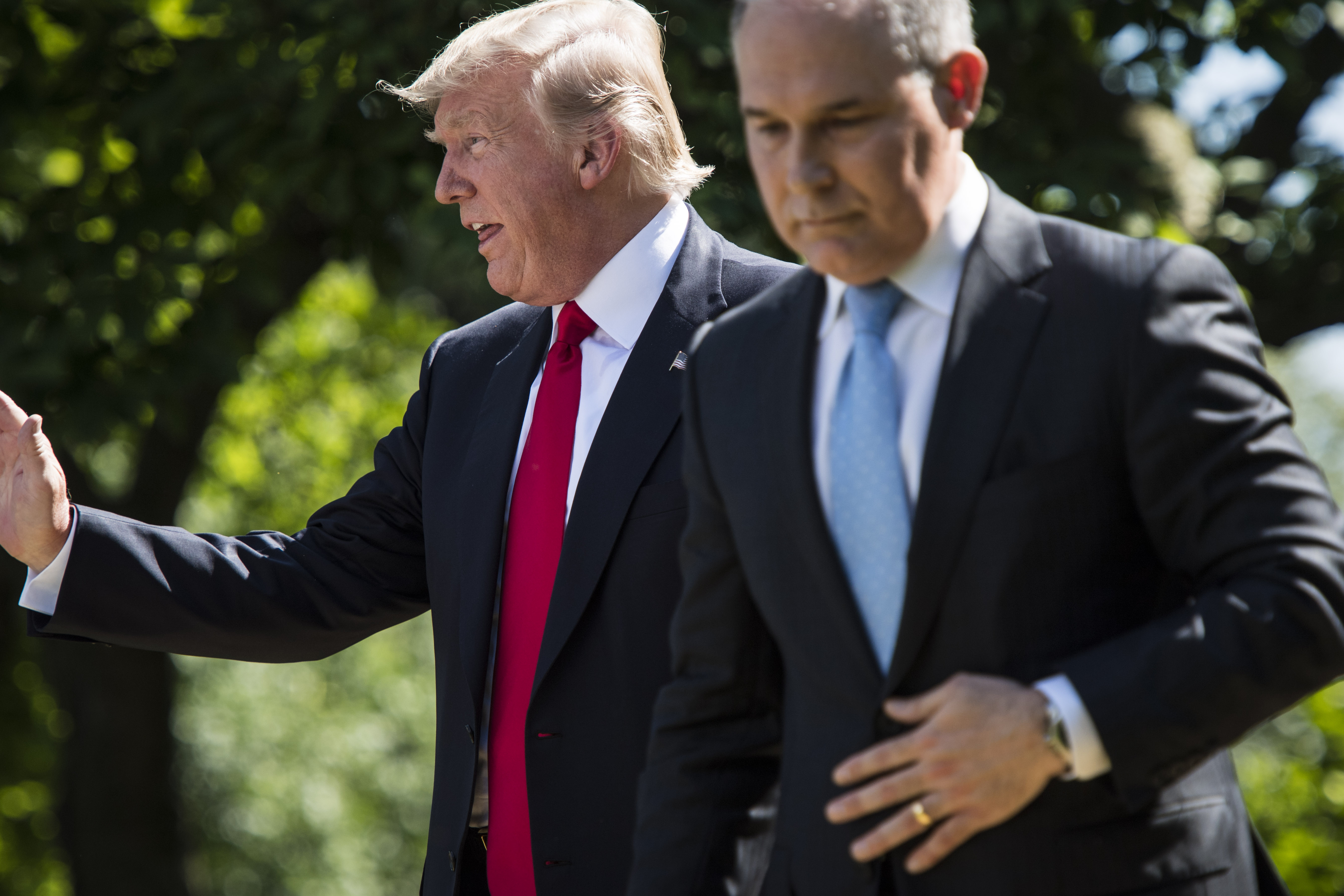 President Donald Trump and EPA Administrator Scott Pruitt speak about the US role in the Paris climate change accord in the Rose Garden at the White House in Washington, DC on Thursday, June 01, 2017. (CREDIT: Jabin Botsford/The Washington Post via Getty Images)