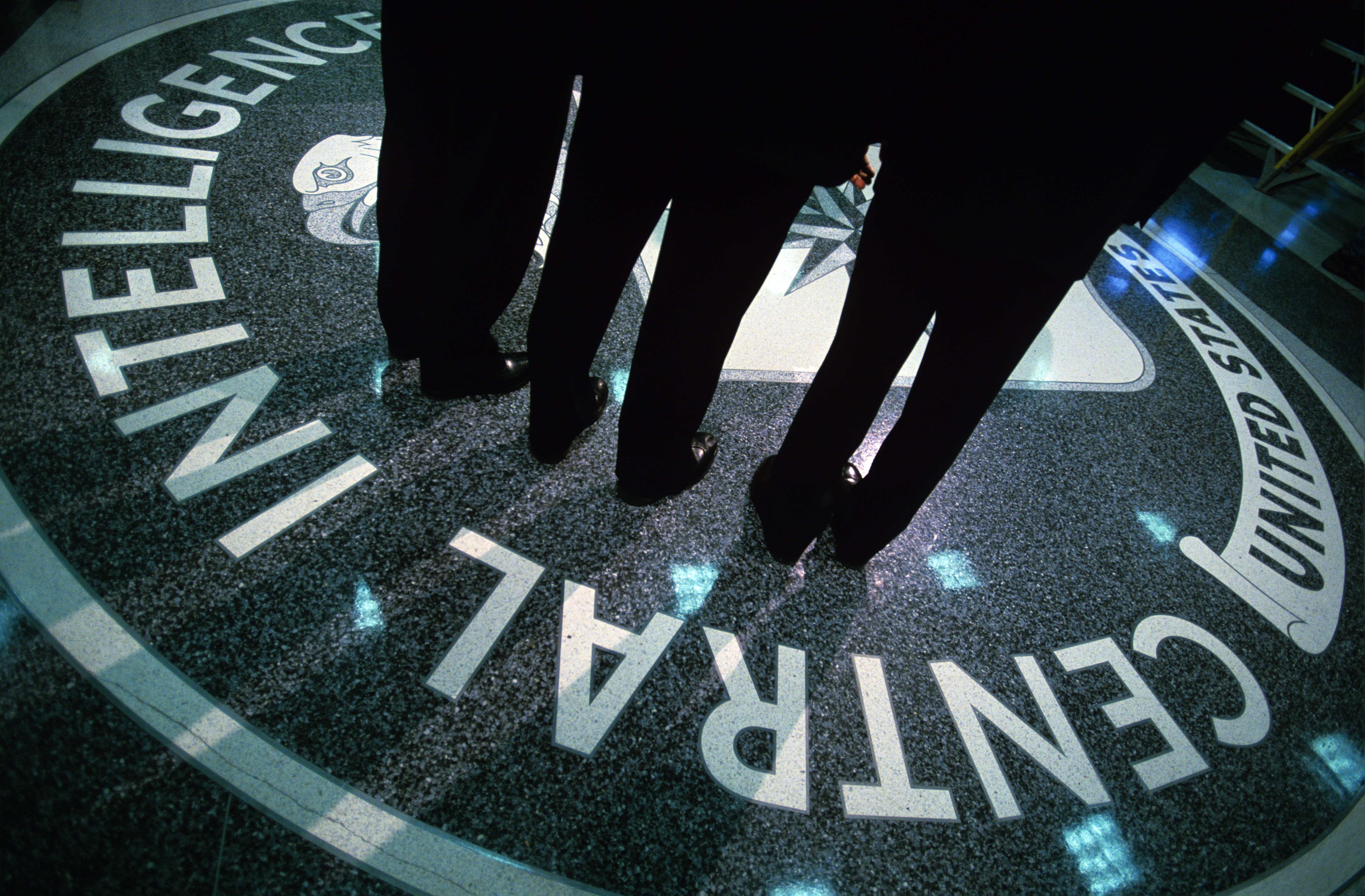The CIA symbol is shown on the floor of CIA Headquarters, in Langley, Virginia, in this July 9, 2004, file photo. CREDIT: Charles Ommanney/Getty Images