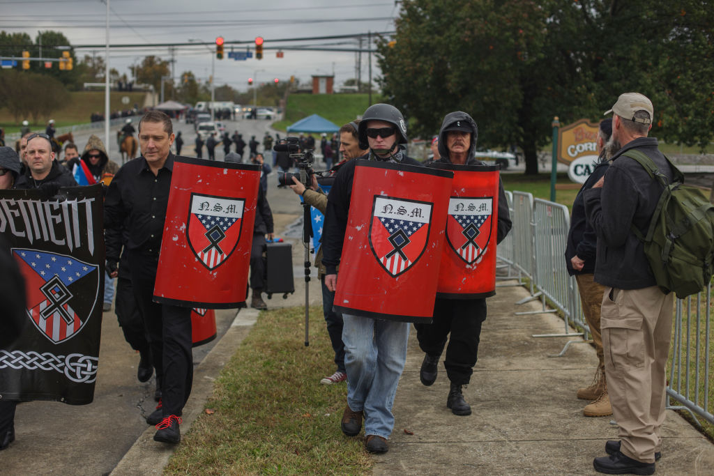 White Supremacists were allowed to bring in plastic shields into the protest area for unknown reasons in Shelbyville, Tennessee, Illinois, US on 28 Ocotber 2017. (Photo by Shay Horse/NurPhoto via Getty Images)