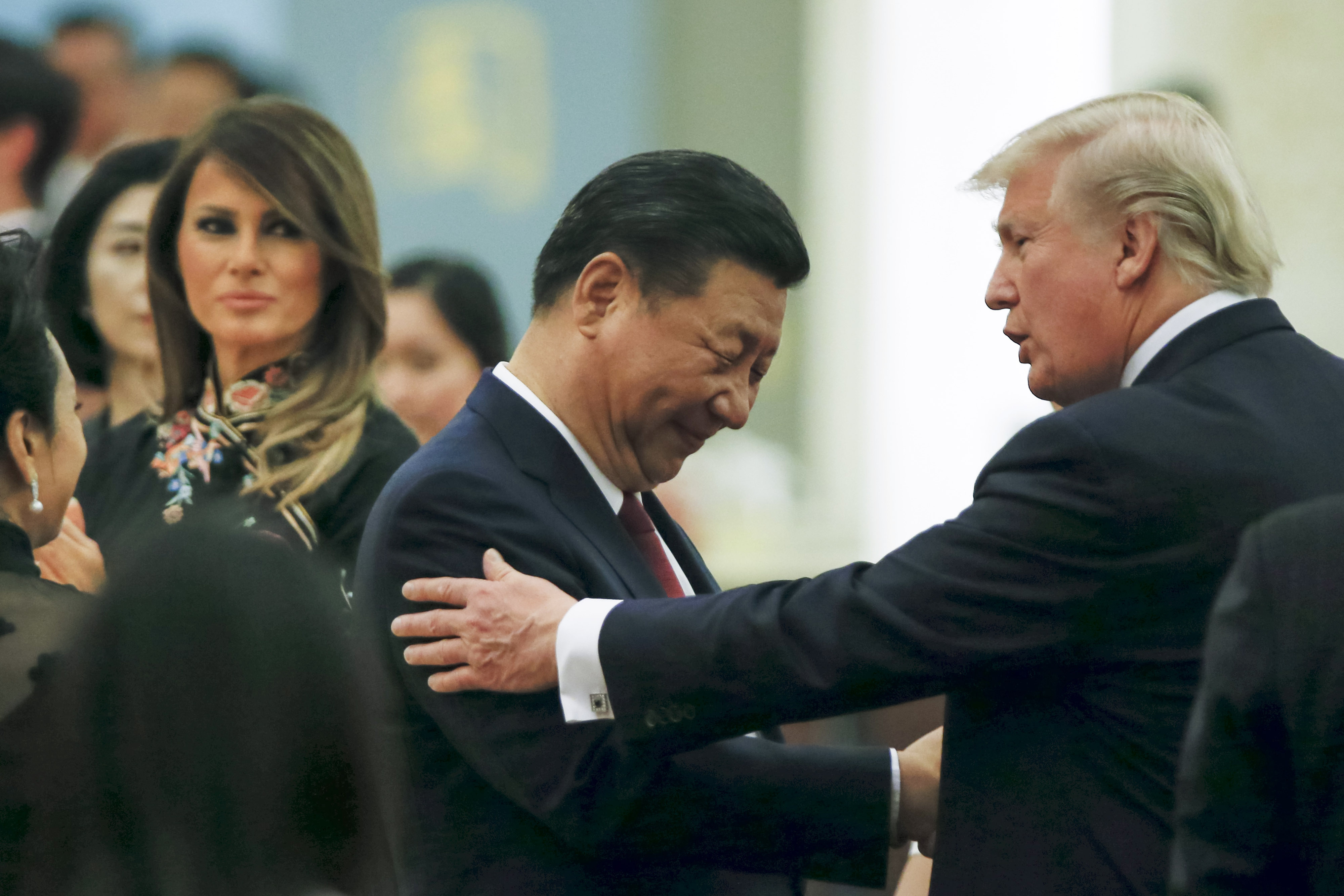 China's President Xi Jinping and U.S. President Donald Trump attend a state dinner at the Great Hall of the People on November 9, 2017 in Beijing, China. (credit: Thomas Peter - Pool/Getty Images)