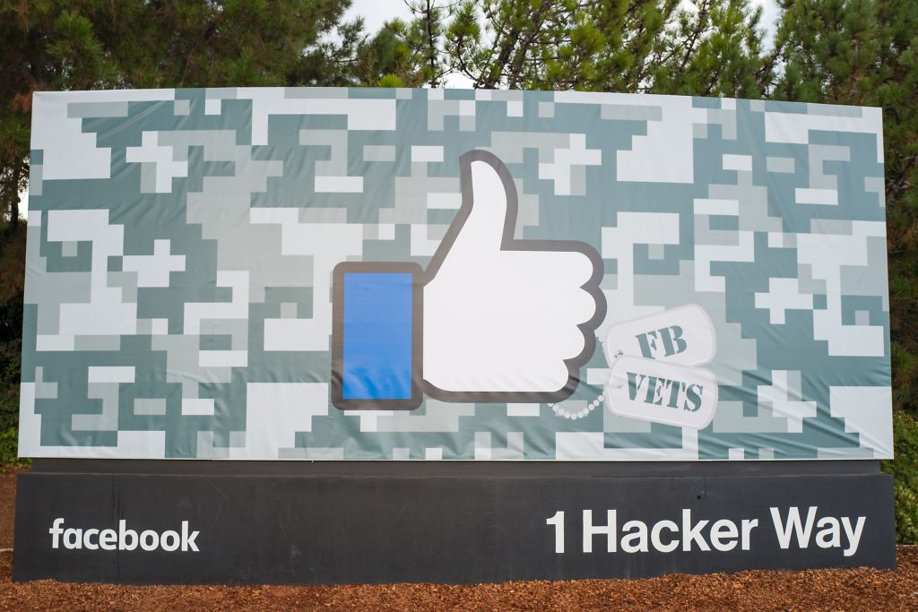 Facebook headquarters sign decorated for Veteran's Day in Menlo Park, California, November 10, 2017. CREDIT: Smith Collection/Gado/Getty Images.