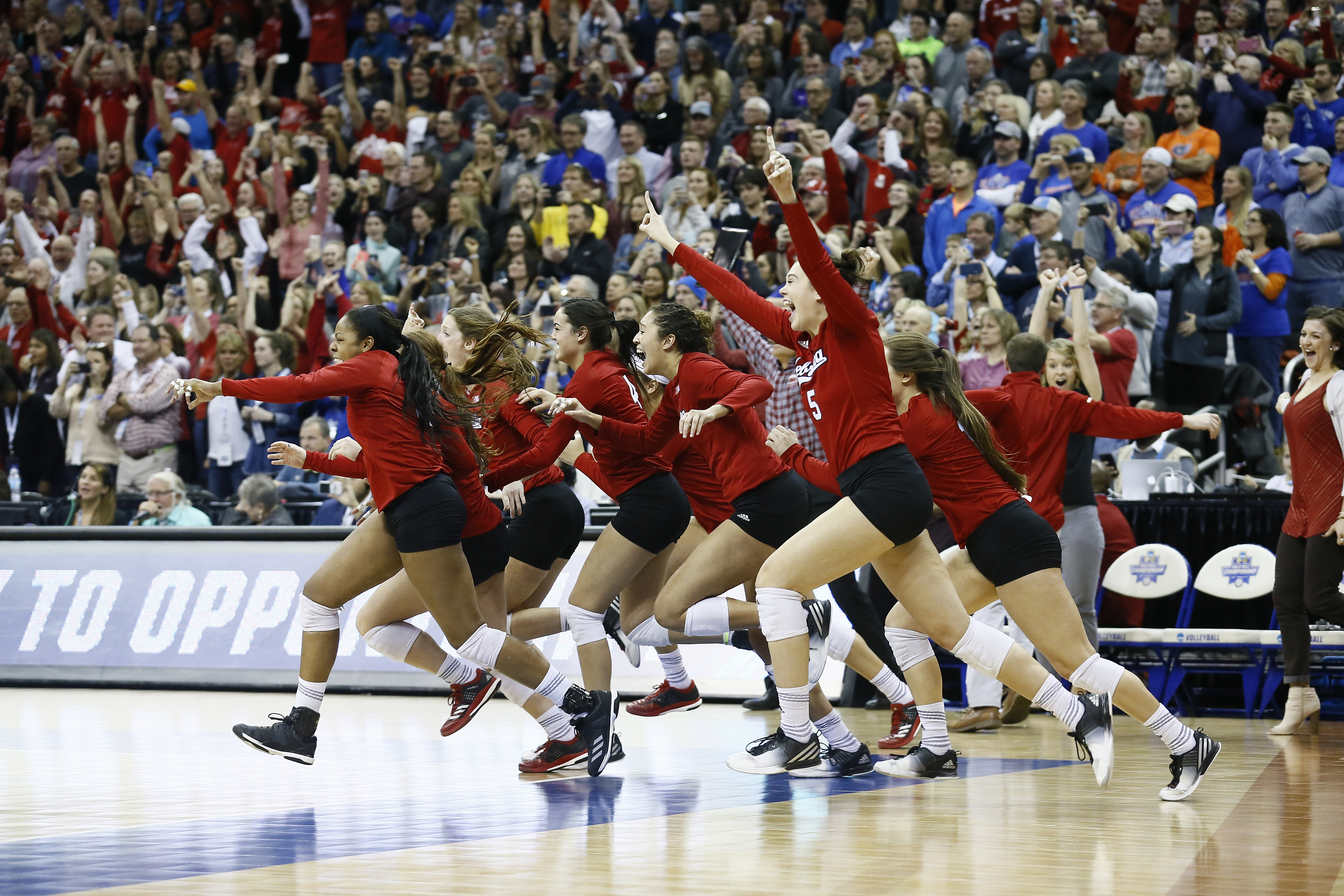 The University of Nebraska bench clears after winning the Division I Women's Volleyball Championship held at Sprint Center on December 16, 2017 in Kansas City, Missouri. (Photo by Tim Nwachukwu/NCAA Photos via Getty Images)