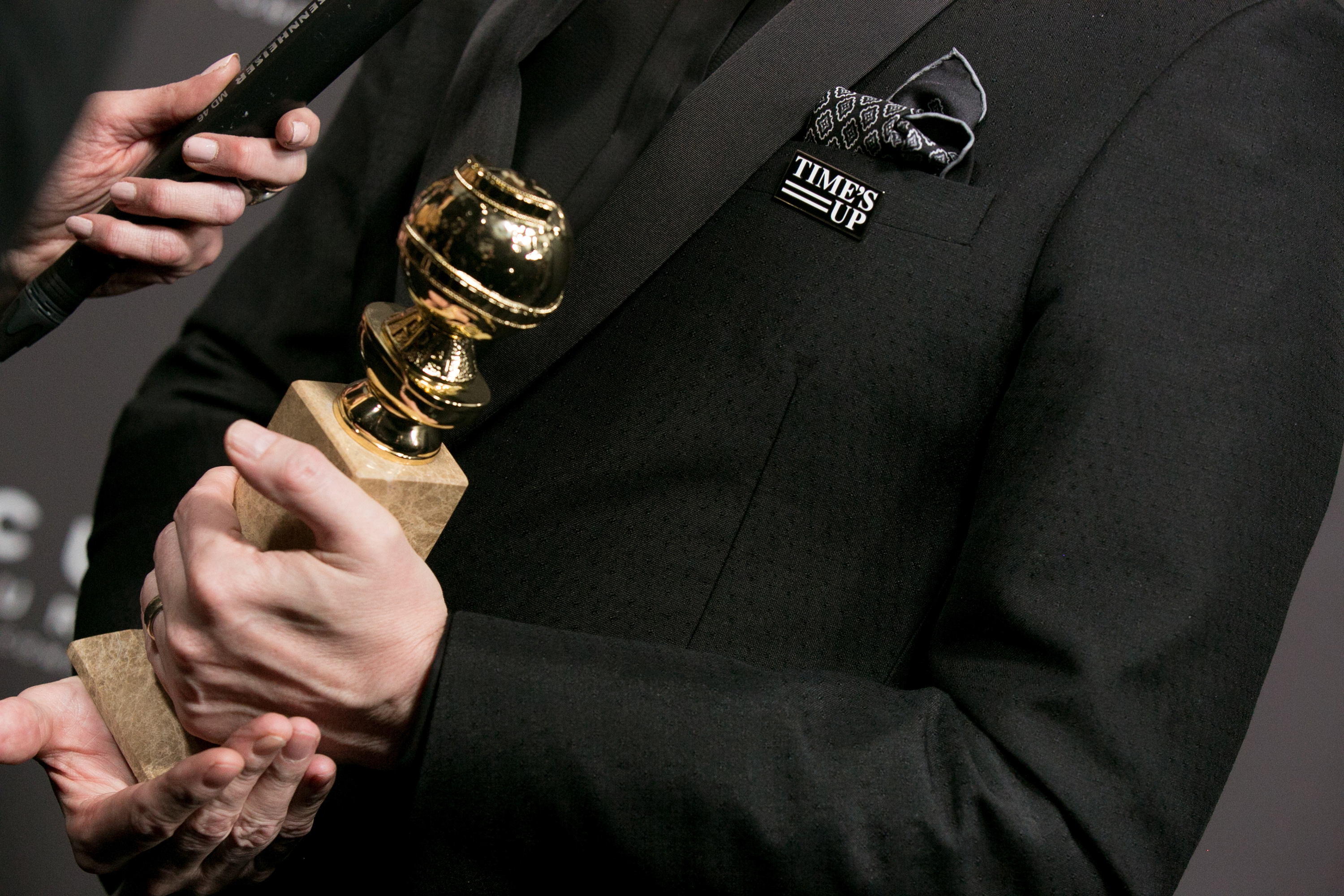 A Time's Up pin on Gary Oldman's lapel at the Focus Features Golden Globe Awards After Party on January 7, 2018. CREDIT: Gabriel Olsen/FilmMagic