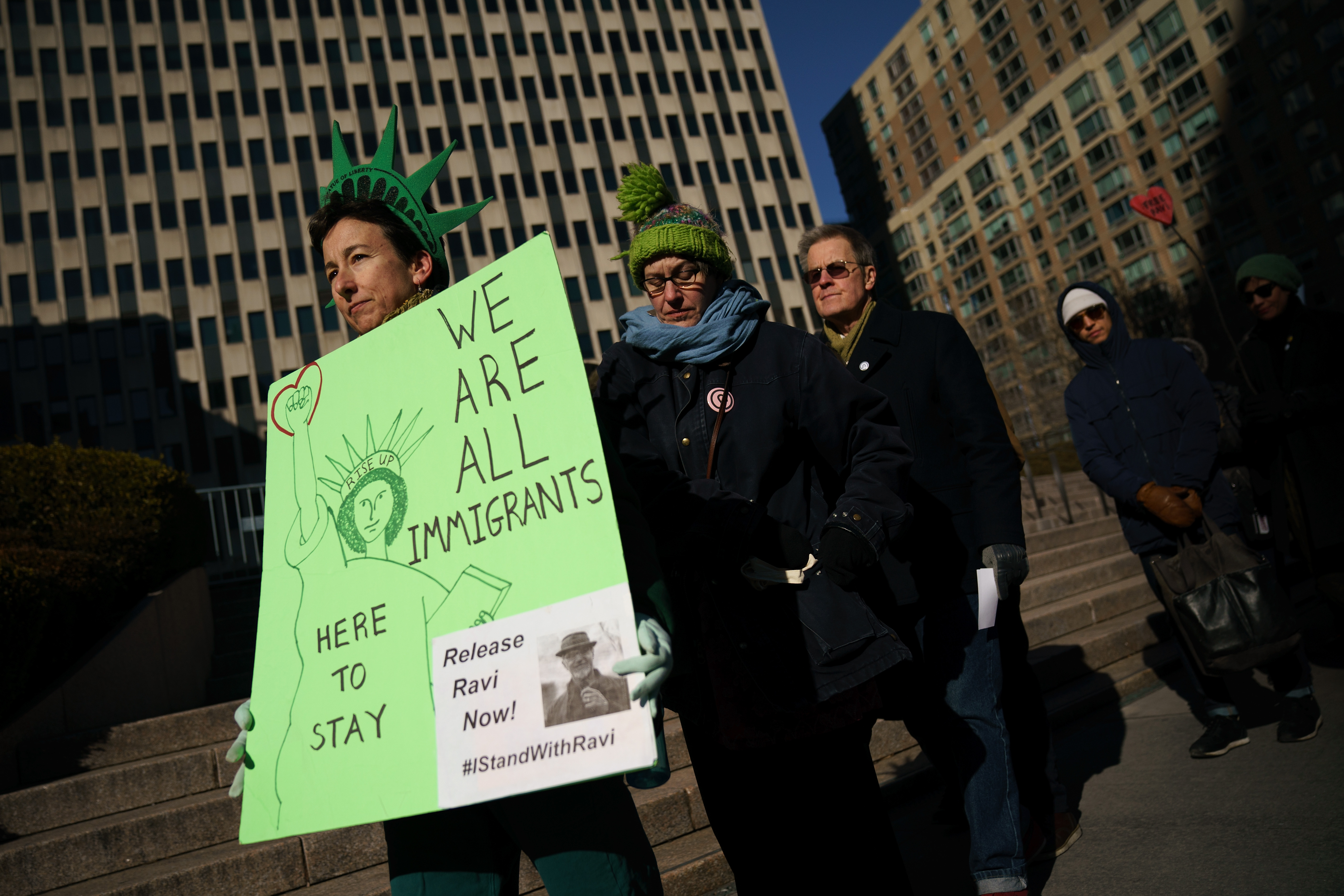 NEW YORK, NY - JANUARY 18: Immigration activists and clergy members participate in a silent prayer walk in protest against the Trump administration's immigration policies outside the U.S. Citizenship and Immigration Services offices, housed in the Jacob Javits Federal Building, January 18, 2018 in New York City. (Photo by Drew Angerer/Getty Images)