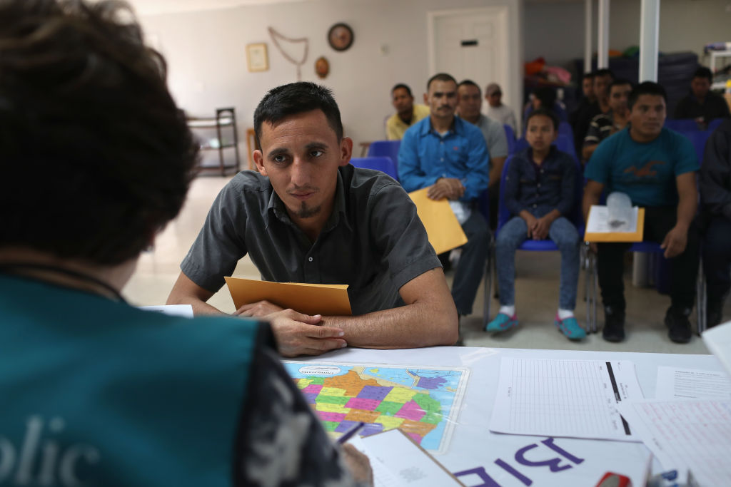 MCALLEN, TX - FEBRUARY 23: Immigrant Respite Center staff receive Central American families after they were released from U.S. immigration officials on February 23, 2018 in McAllen, Texas. CREDIT: John Moore/Getty Images