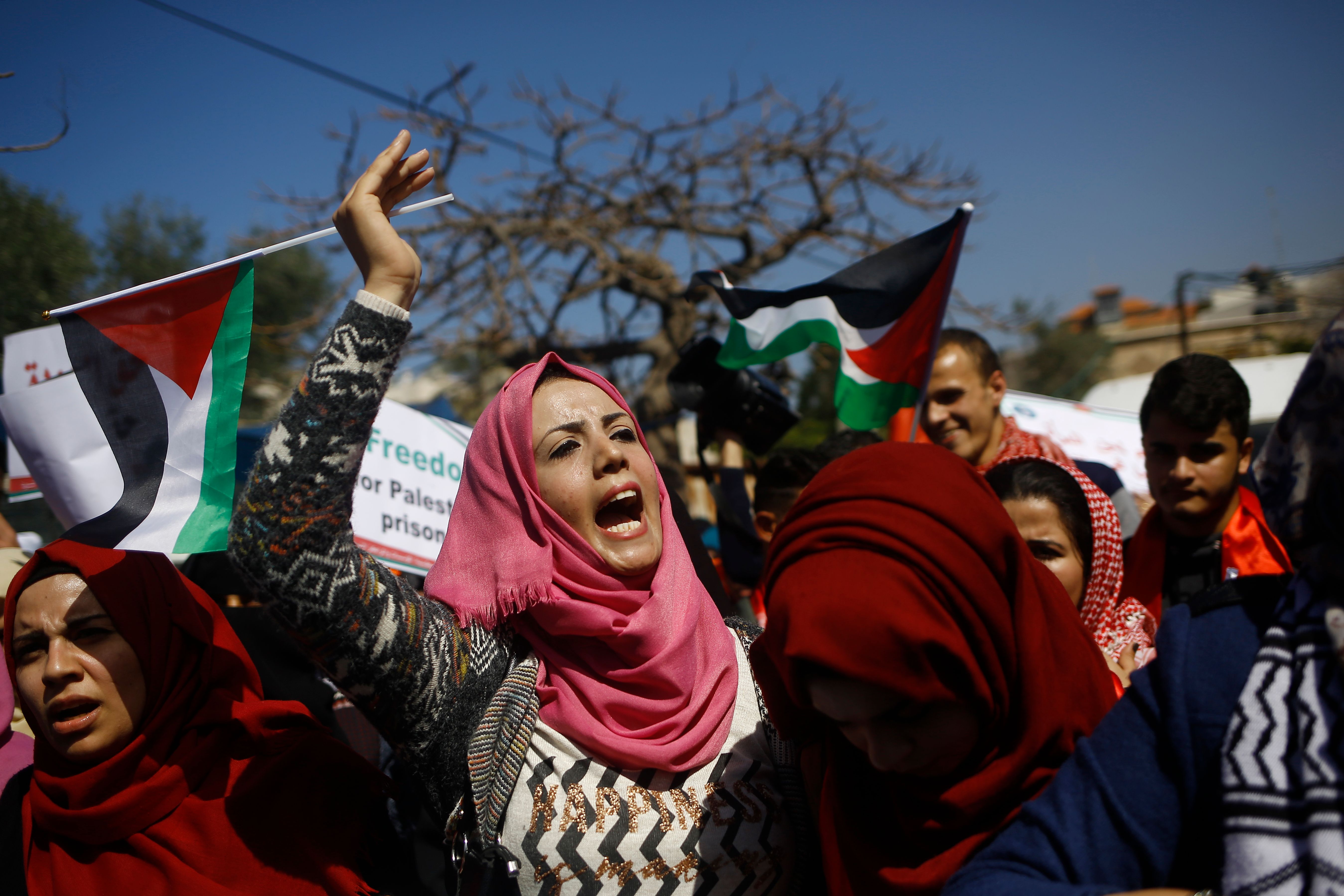 Palestinian women shout anti-Israeli slogans during a rally to mark International Women's Day in Gaza City on March 7, 2018. (CREDIT: MOHAMMED ABED/AFP/Getty Images)