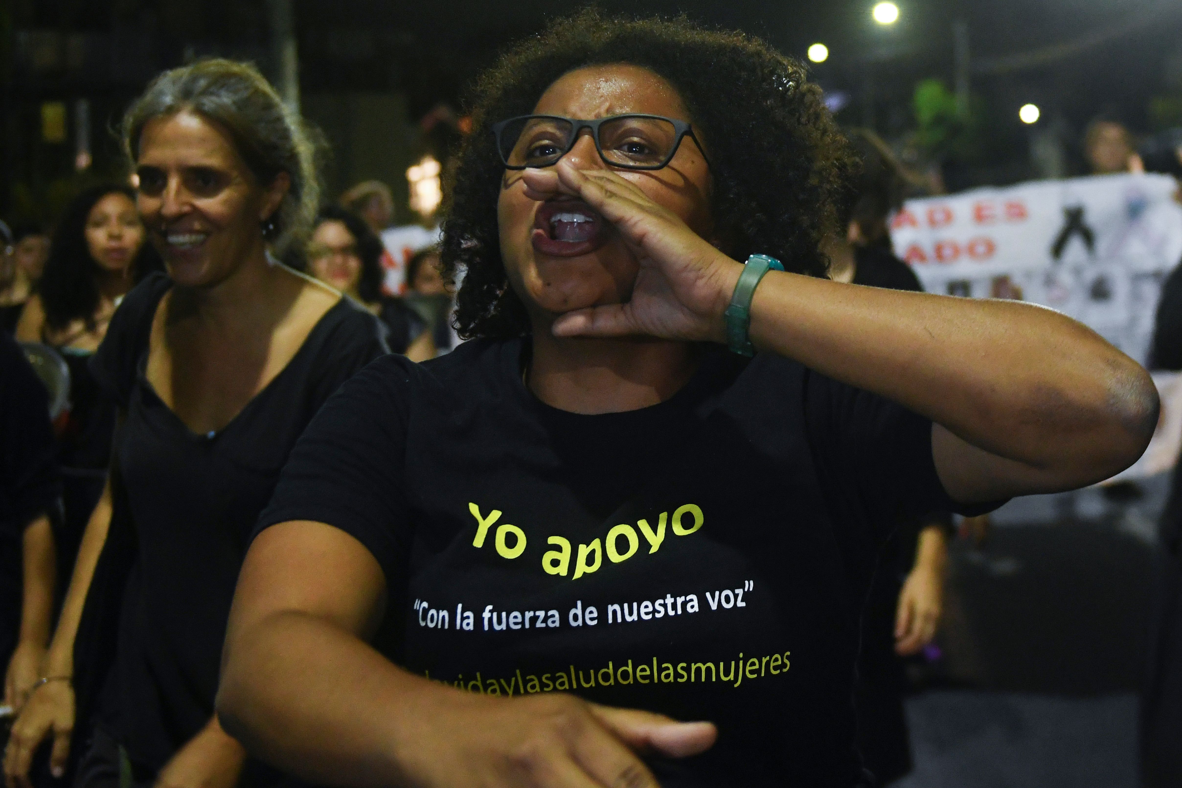Salvadoran women participate in a protest in commemoration of women murdered in El Salvador, as part of the celebration of International Women's Day in San Salvador on March 7, 2018.
(CREDIT: MARVIN RECINOS/AFP/Getty Images)