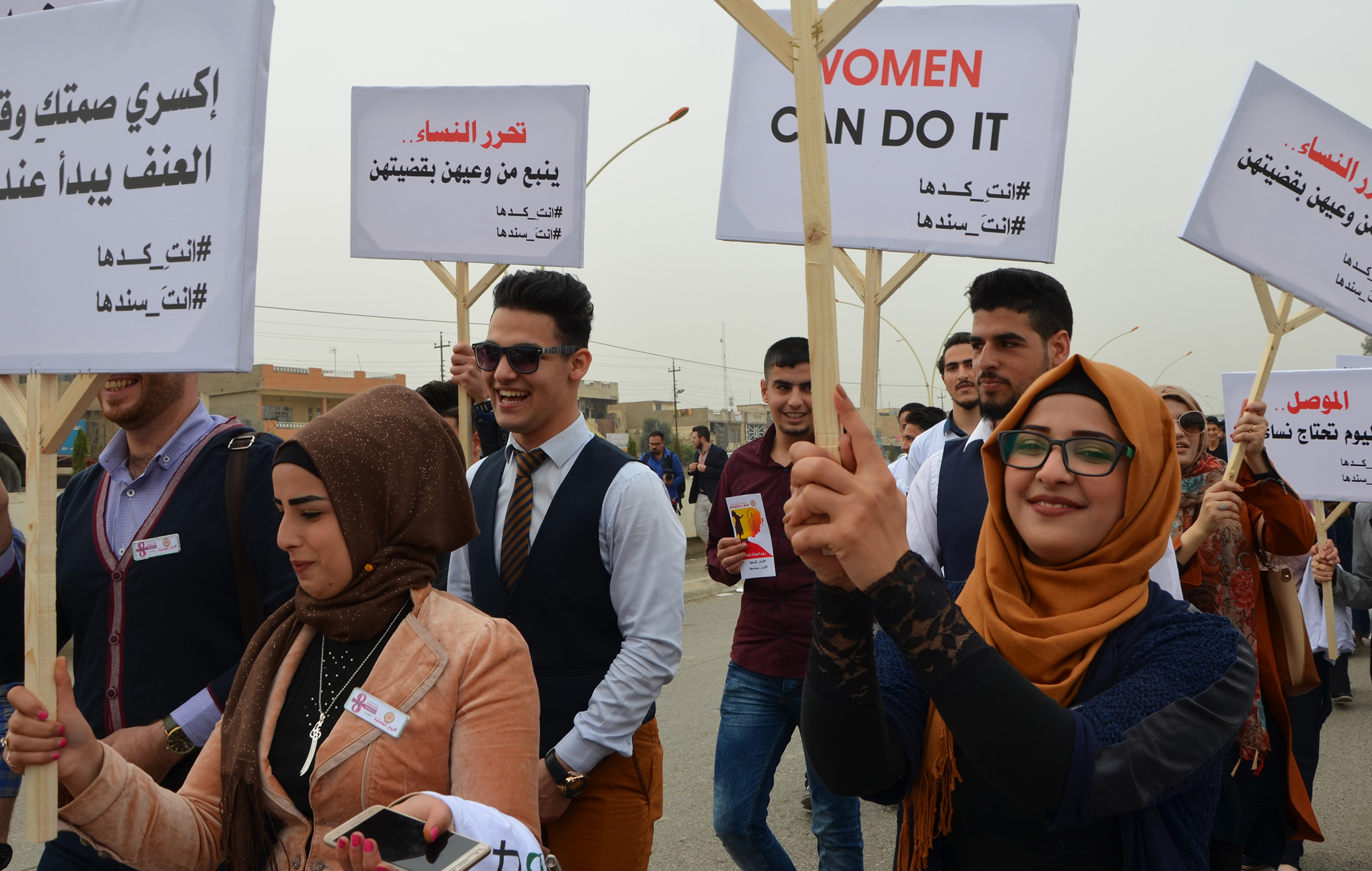 Iraqi youths take part in a Women's Day march in the former embattled city of Mosul on March 8, 2018 eight months after Iraqi forces retook the northern Iraqi city from Islamic State. (CREDIT: AHMAD MUWAFAQ/AFP/Getty Images)