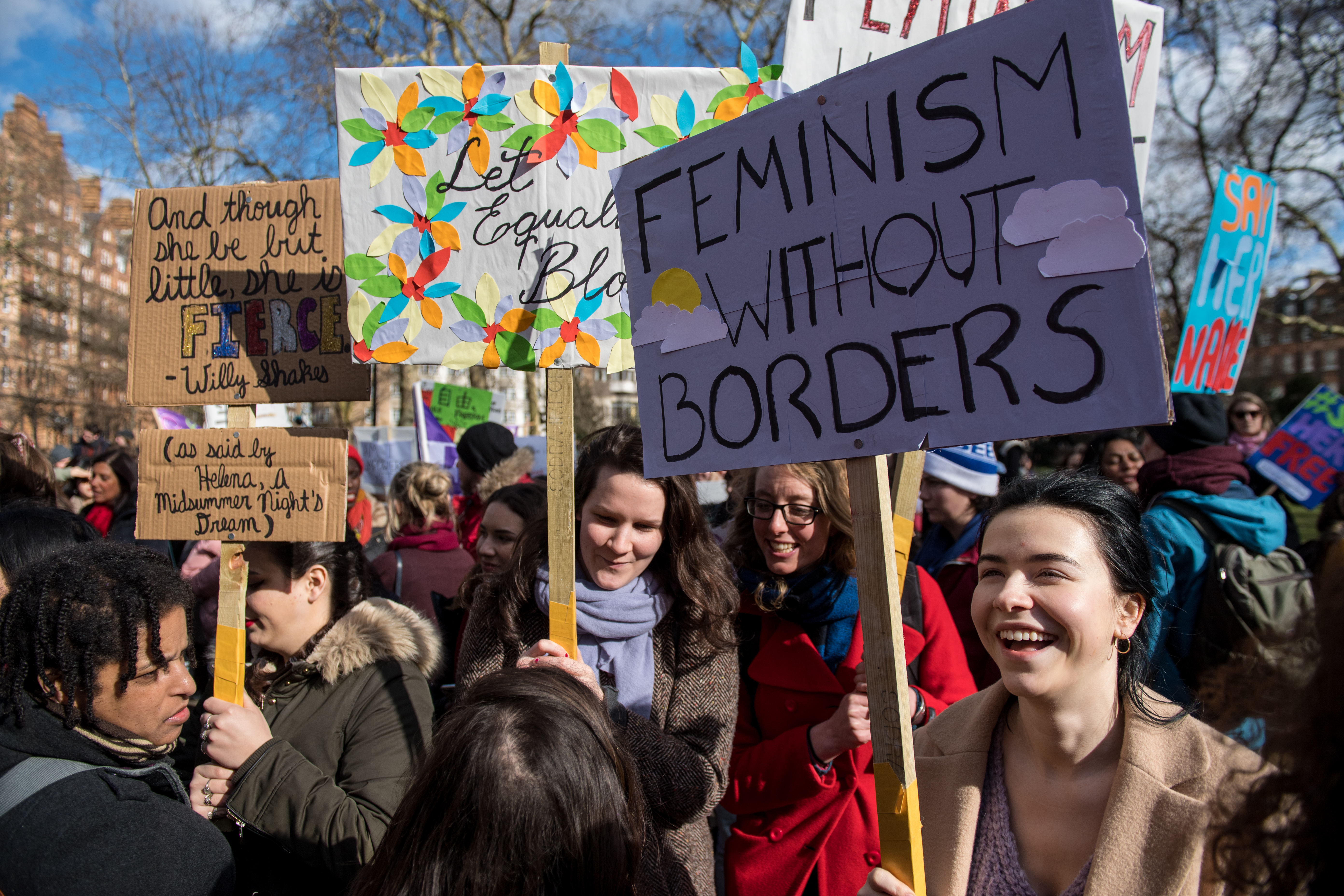 Women's rights demonstrators hold placards during a rally in Russell Square on International Women's Day on March 8, 2018 in London, England. International Women's (CREDIT: Chris J Ratcliffe/Getty Images)