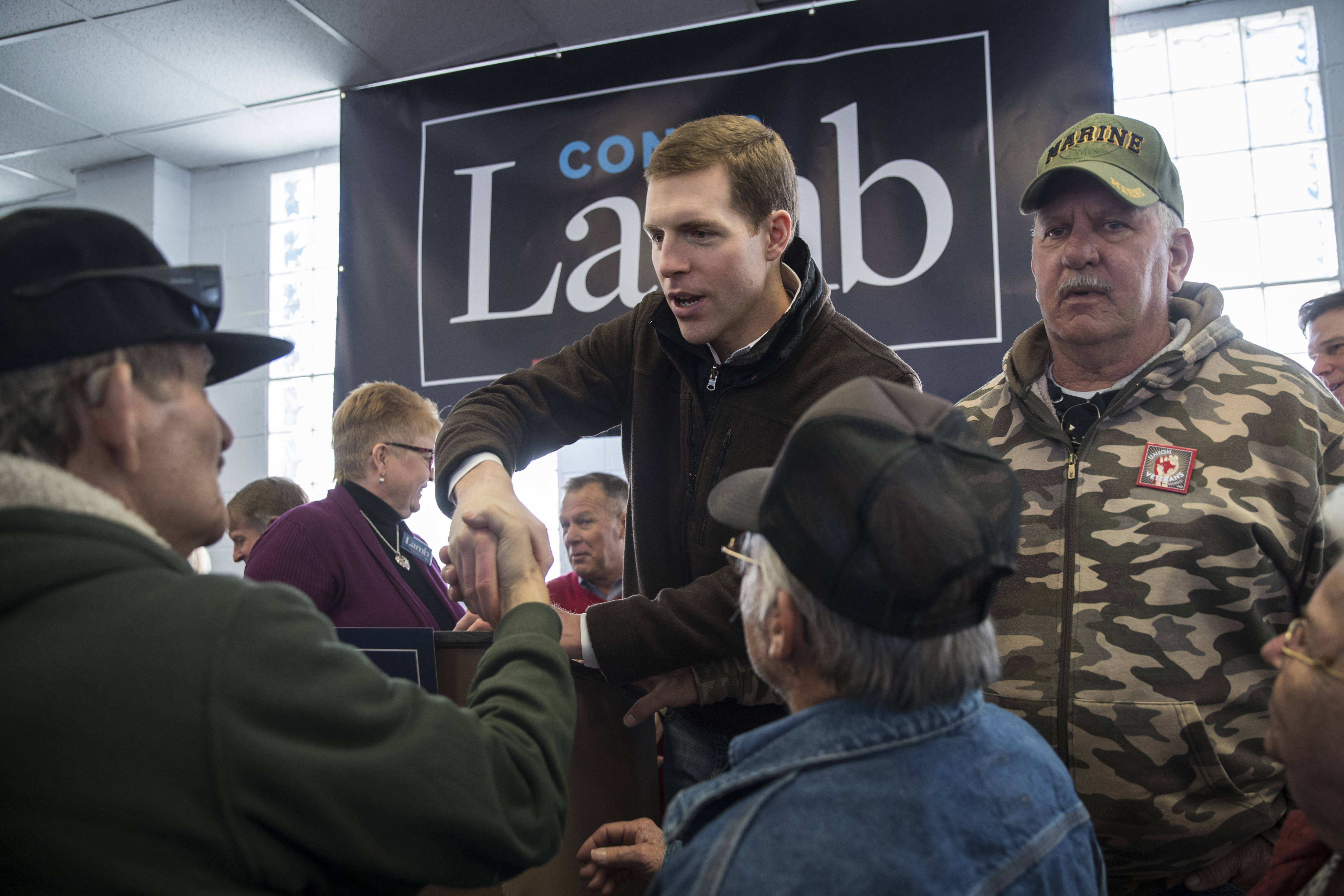 Conor Lamb, Democratic Congressional candidate for Pennsylvania's 18th district, greets supporters after speaking at a campaign rally. CREDIT: Photo by Drew Angerer/Getty Images