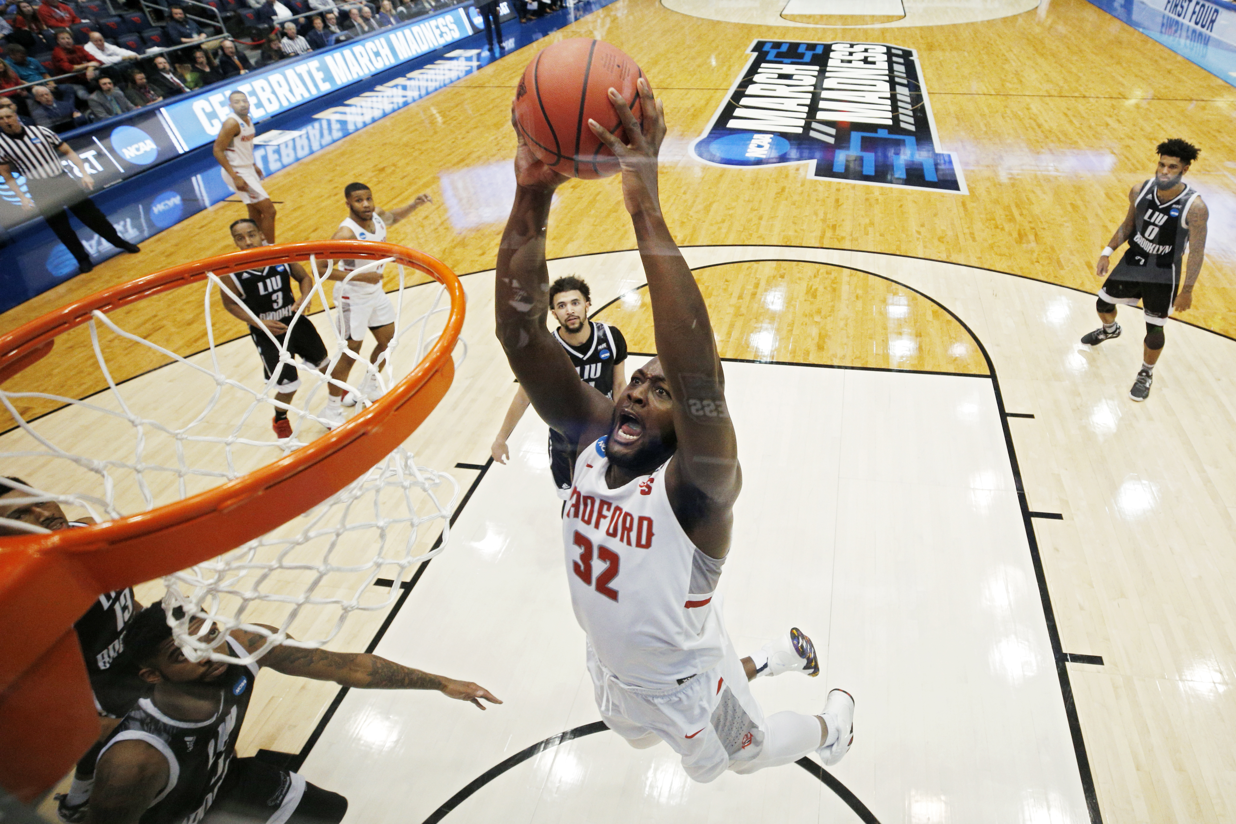 DAYTON, OH - MARCH 13: Randy Phillips #32 of the Radford Highlanders goes in for a dunk against the LIU Brooklyn Blackbirds in the first half of a First Four game in the 2018 NCAA Basketball Tournament at UD Arena on March 13, 2018 in Dayton, Ohio. (Photo by Joe Robbins/Getty Images)