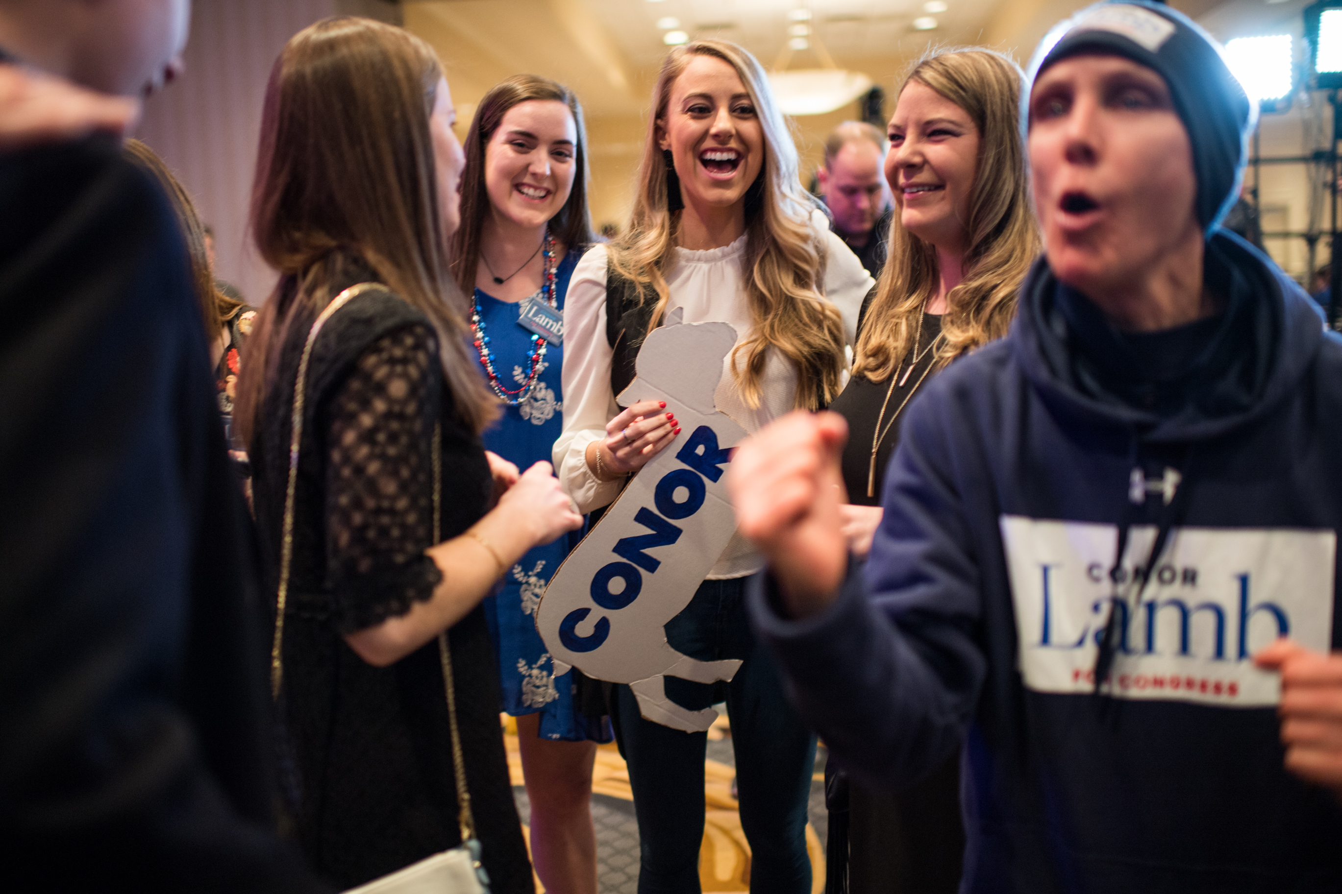 People cheer at the Hilton Garden Inn Pittsburgh-Southpointe where a watch party is being held for Democrat candidate Conor Lamb as results come in during Pennsylvania's 18th Congressional District special election on Tuesday, March 13, 2018, in Canonsburg, PA. (credit: Salwan Georges/The Washington Post via Getty Images)