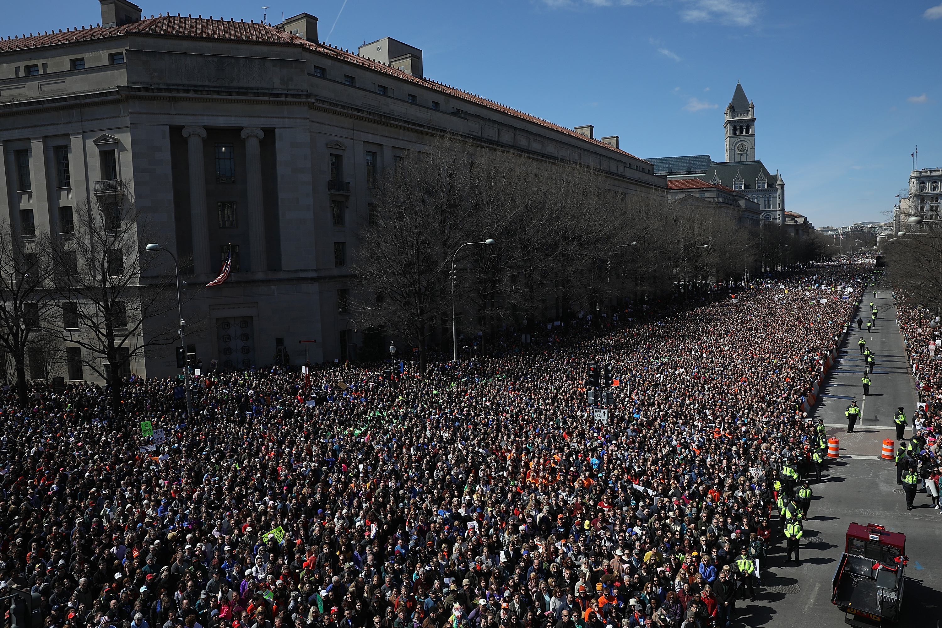 WASHINGTON, DC - MARCH 24: Gun reform advocates line Pennsylvania Avenue while attending the March for Our Lives rally March 24, 2018 in Washington, DC. Hundreds of thousands of demonstrators, including students, teachers, and parents are expected to gather for the anti-gun violence rally, spurred largely by the shooting that took place on Valentine's Day at Marjory Stoneman Douglas High School in Parkland, Florida where 17 people died. (CREDIT: Win McNamee/Getty Images)