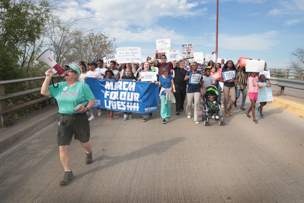 Demonstrators participate in a March for Our Lives rally and march on March 24, 2018 in Killeen, Texas. (CREDIT: Scott Olson/Getty Images)