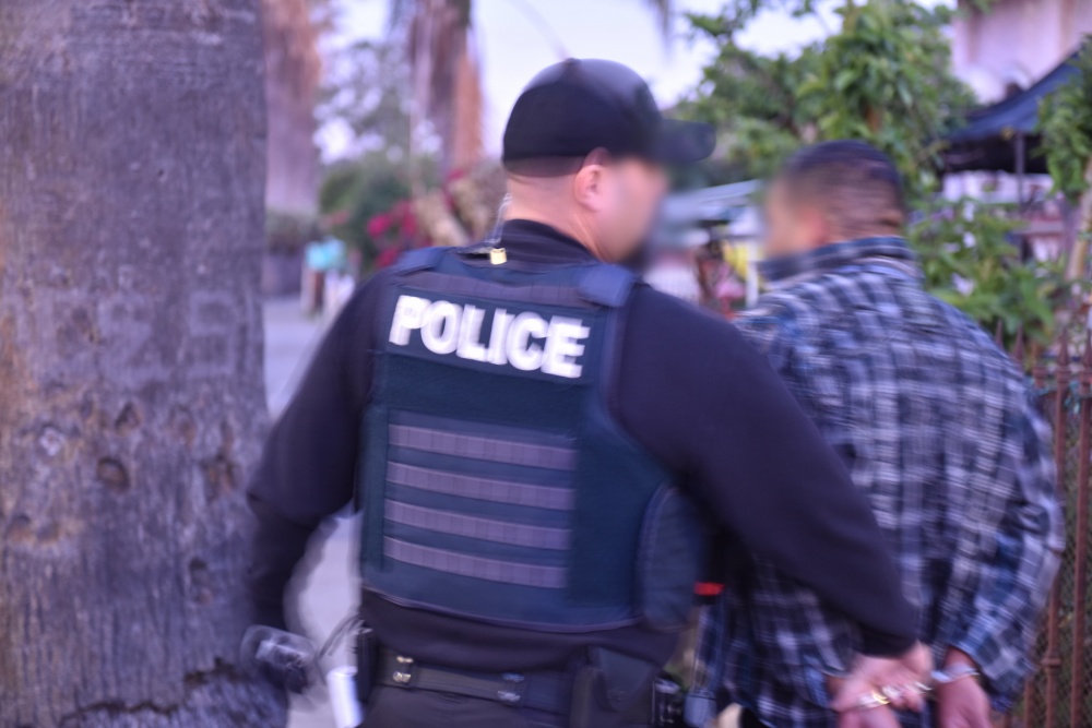 Deportation officers arrest undocumented immigrants during targeted enforcement operation. (CREDIT: U.S. Immigration and Customs Enforcement agency)