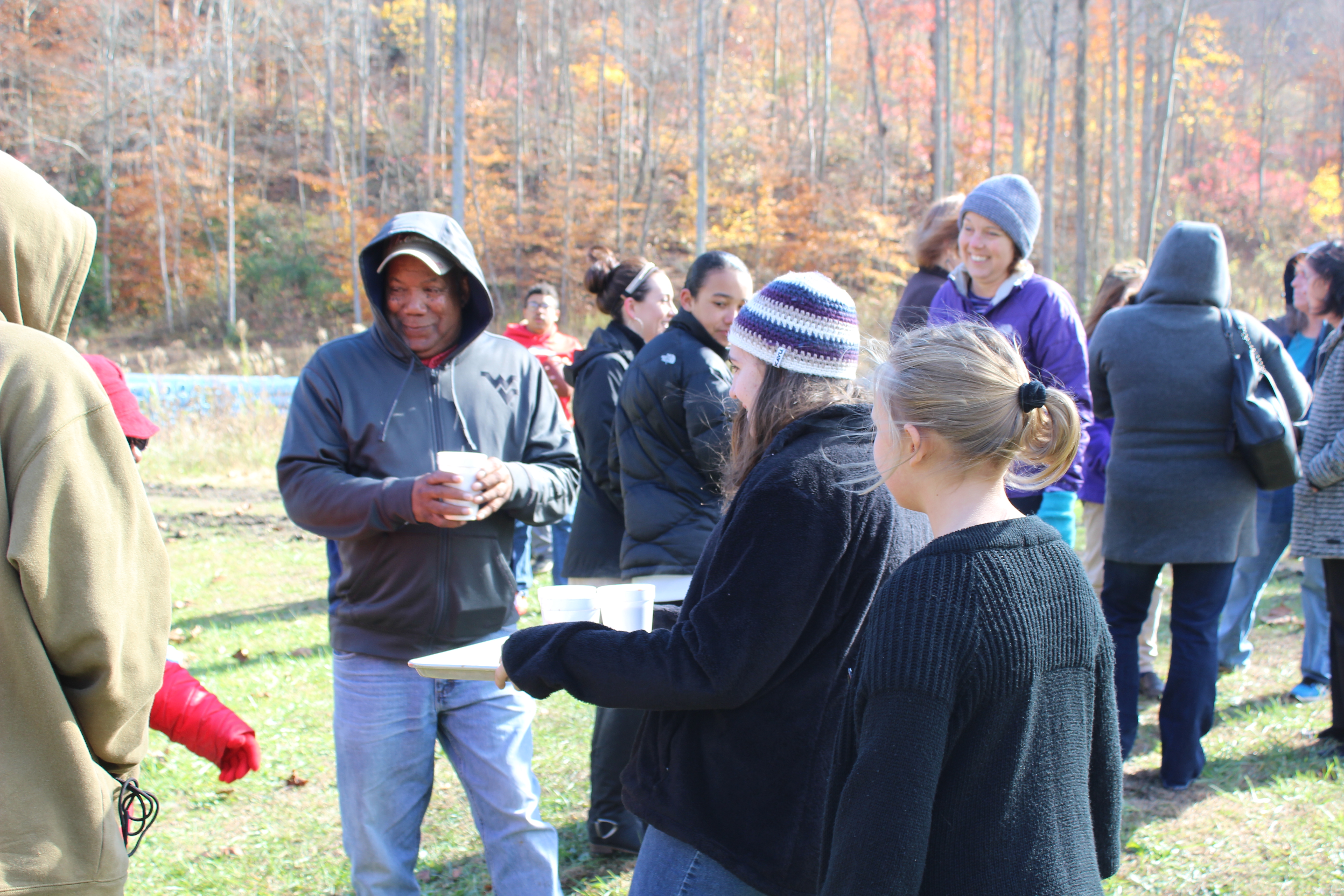 Percy Edward "Eddie" Fruit, center with coffee cup, and other residents of Minden, West Virginia, are fighting for EPA funds to relocate out of the toxic town. CREDIT: Minden Community Action Team, Headwaters Defense