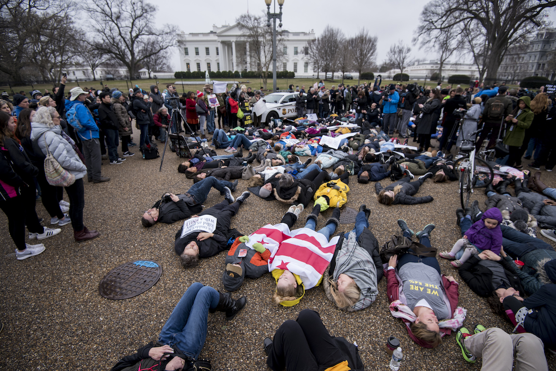 Washington, D.C. area students and supporters protest against gun violence with a lie-in outside of the White House on Monday, Feb. 19, 2018. (CREDIT: Getty Images/Bill Clark/CQ Roll Call
