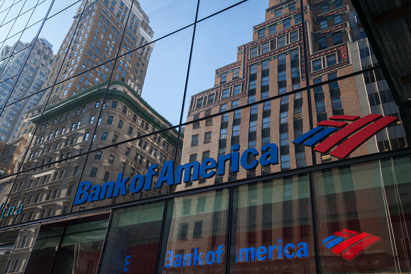 Building are seen reflected on the exterior of a Bank of America Corp. branch in New York, U.S., on Monday, Jan. 15, 2018. Bank of America Corp. is scheduled to release earnings figures on January 17. Photographer: Daniel Tepper/Bloomberg via Getty Images