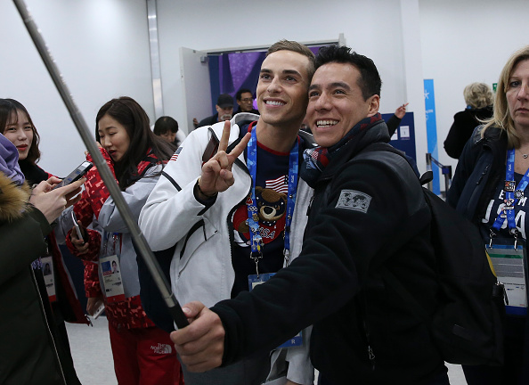 Adam Rippon (left) won't be at the White House Friday. CREDIT: Getty Images