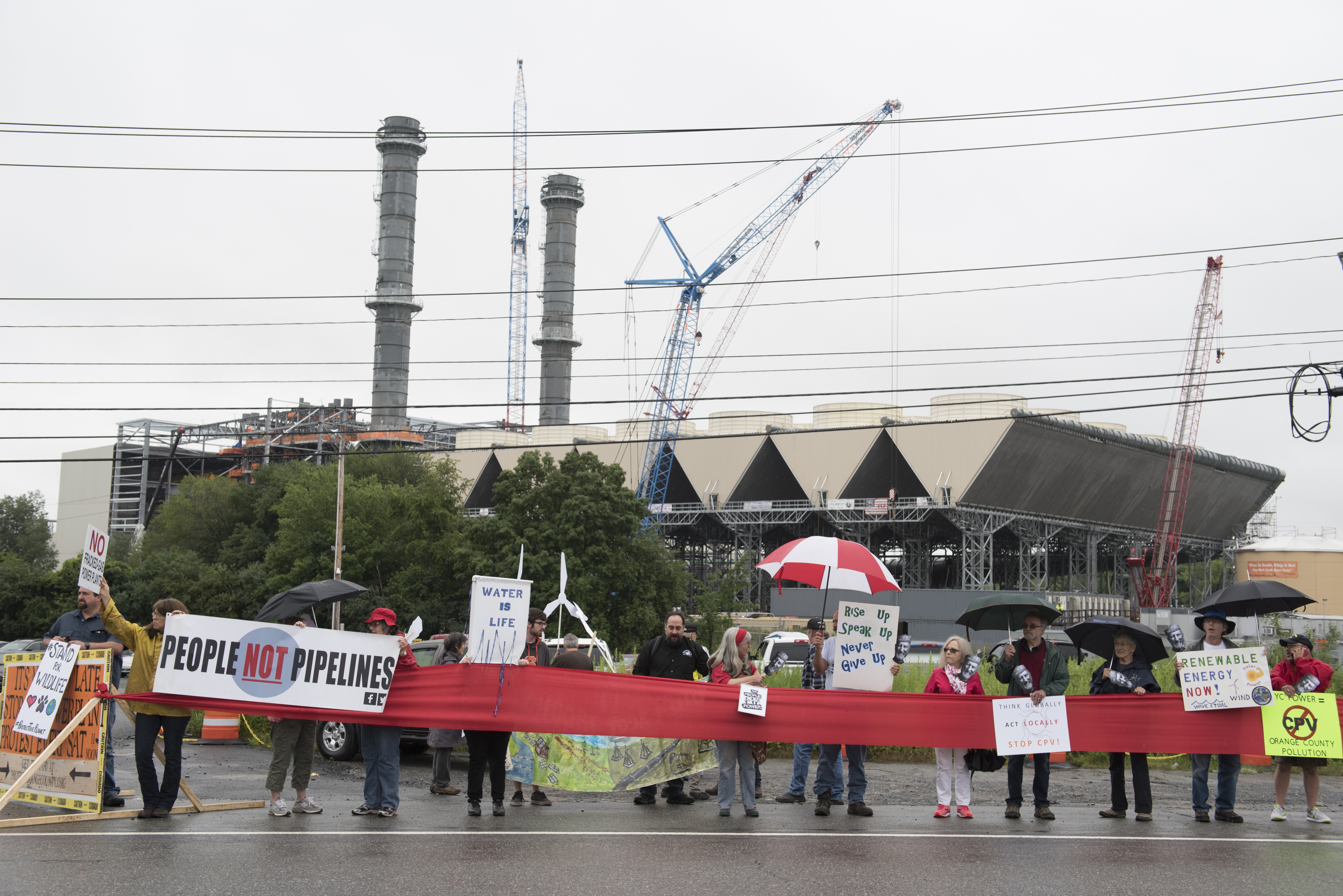 Protesters seen outside the CPV Valley Energy Center project on July 14, 2017 in Wawayanda, New York. CREDIT: George Billard/Getty Images