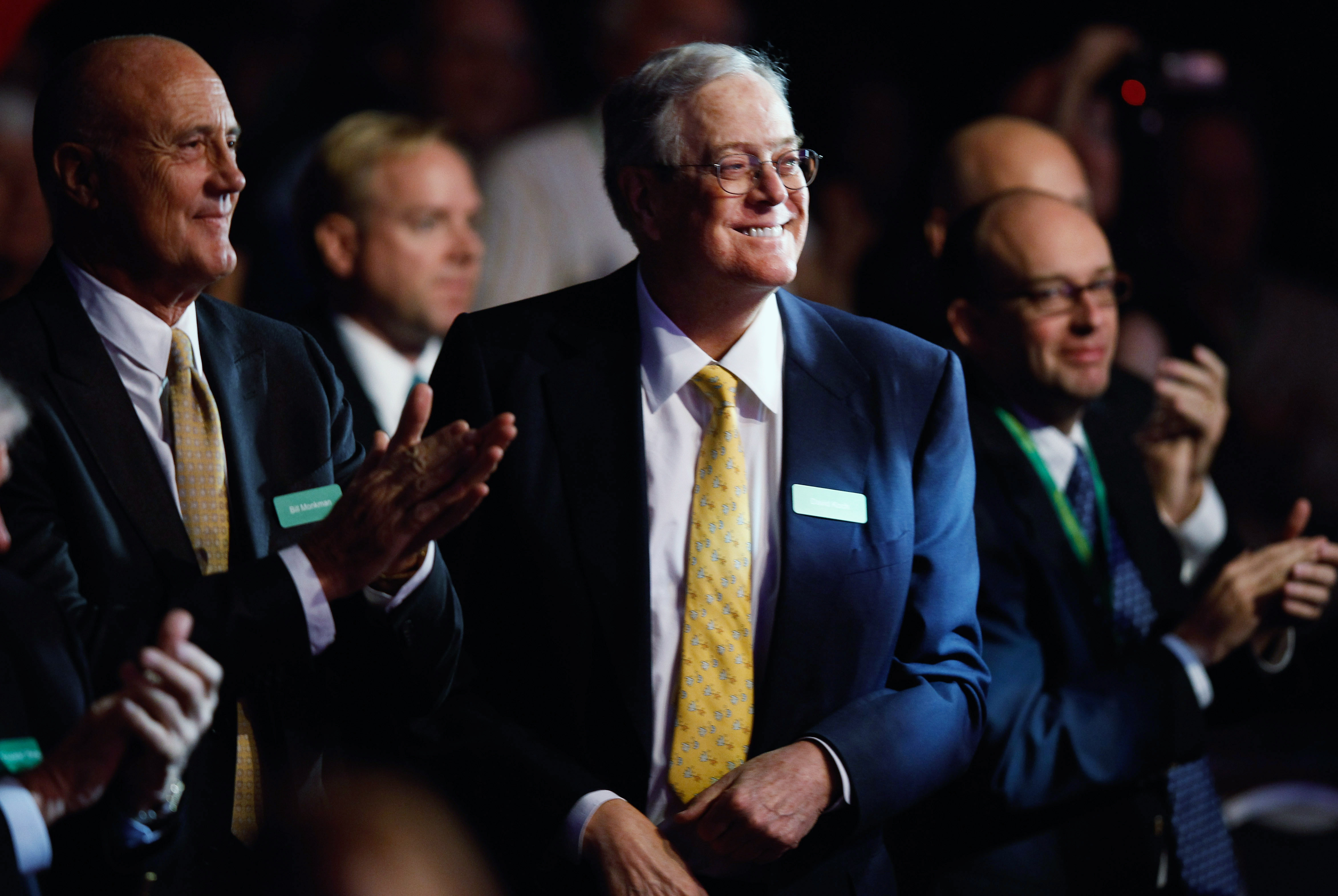Americans for Prosperity Foundation chairman and Koch Industries Executive Vice President David H. Koch listens to speakers during the Defending the American Dream Summit. CREDIT: Chip Somodevilla/Getty Images