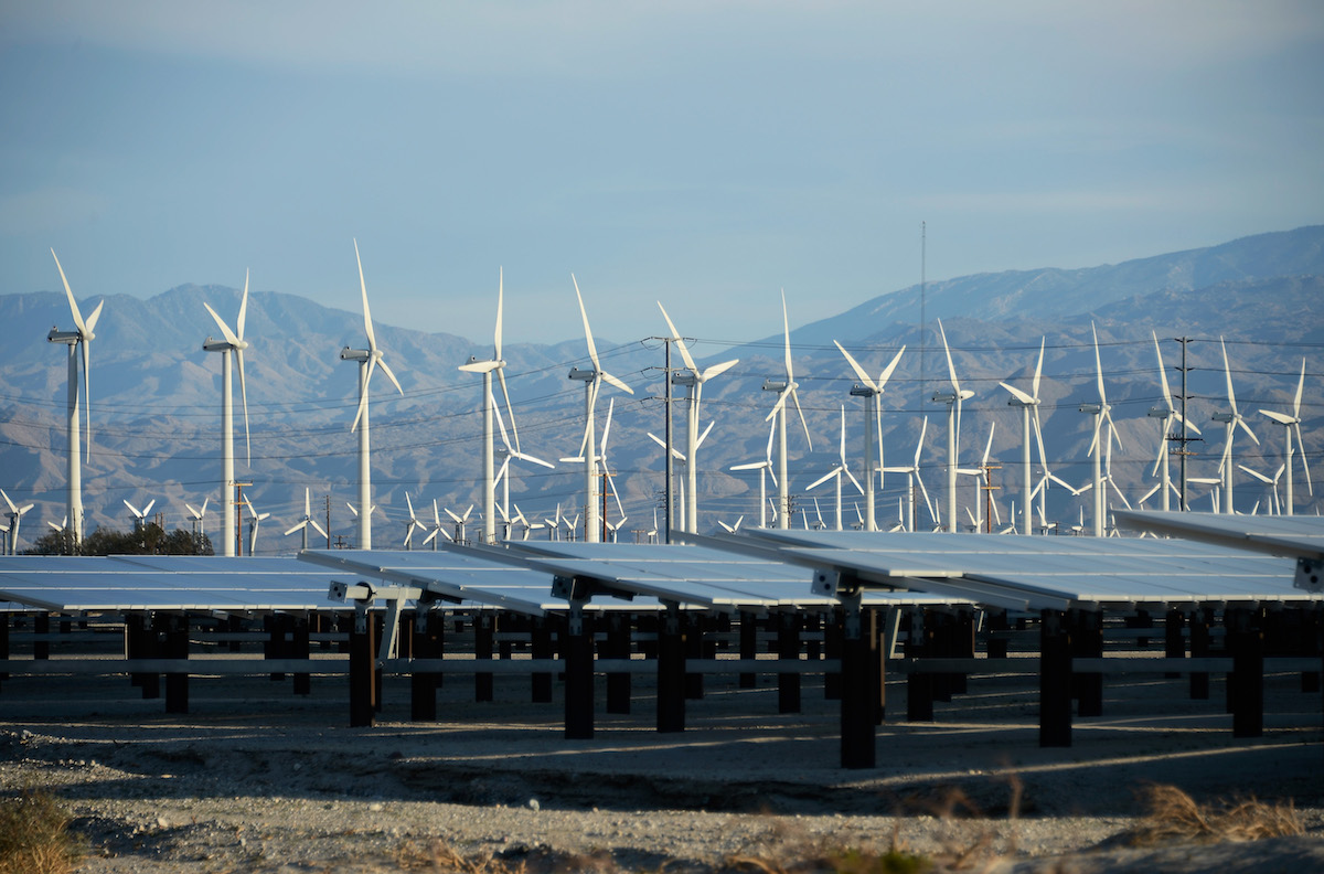 Wind turbines and solar panels in California. CREDIT: Kevork Djansezian/Getty Images