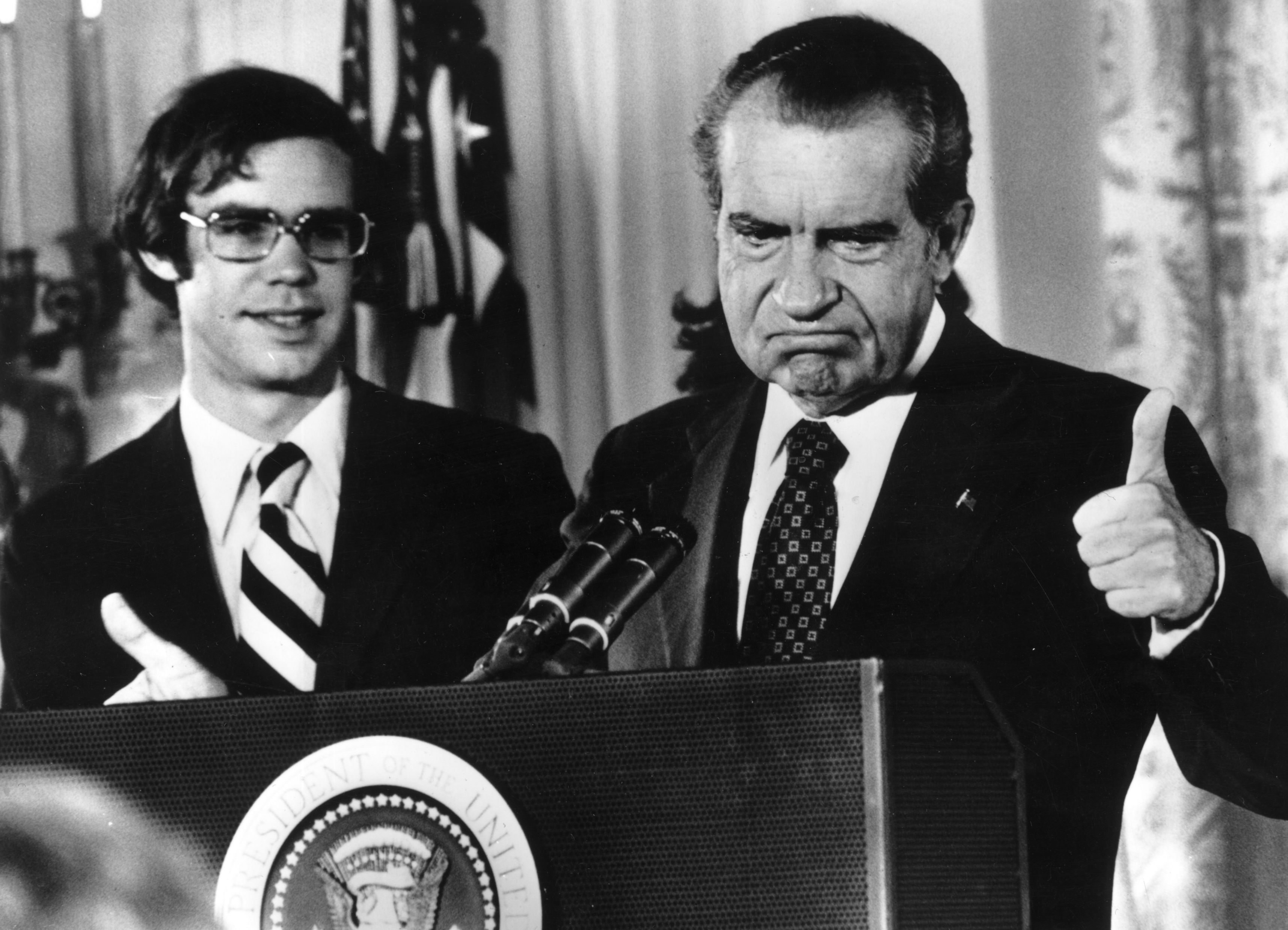 Richard Nixon (1913 - 1994) gives the thumbs up after his resignation as 37th President of the United States. His son-in-law David Eisenhower is with him as he says goodbye to his staff at the White House, Washington DC. (Photo by Gene Forte/Consolidated News Pictures/Getty Images)