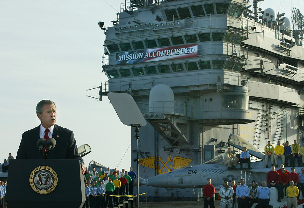 ABOARD THE USS ABRAHAM LINCOLNPresdient George W. Bush, delivers an inspirational speech to the sailors and the nation, on the flightdeck of the aircraft carrier USS Abraham Lincoln, 30 miles off the coast of San Diego, (05/01/03), that the Iraqi conflict was coming to an end but the war on terrorism is not over. The president will spend the night on the ship before leaving early tomorrow morning. (Photo by Don Tormey/Los Angeles Times via Getty Images)