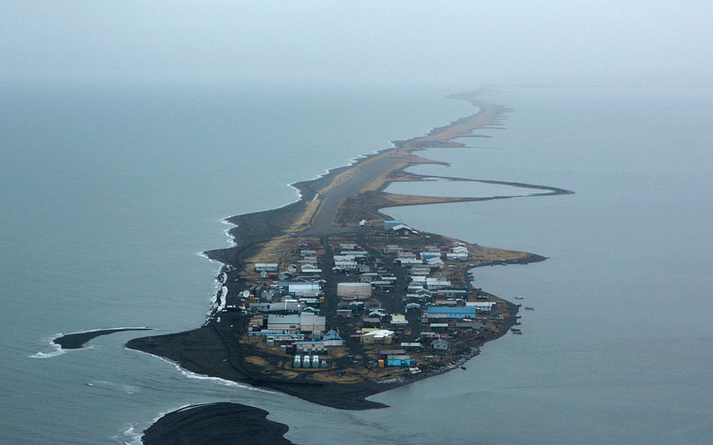 Kivalina, Alaska sits in the Chukchi Sea. The island is steadily being eaten away at the shoreline. Some in the village of about 400 residents say it's global warming and the town must be moved before the sea washes it away. Credit: Don Bartletti/Los Angeles Times via Getty Images.
