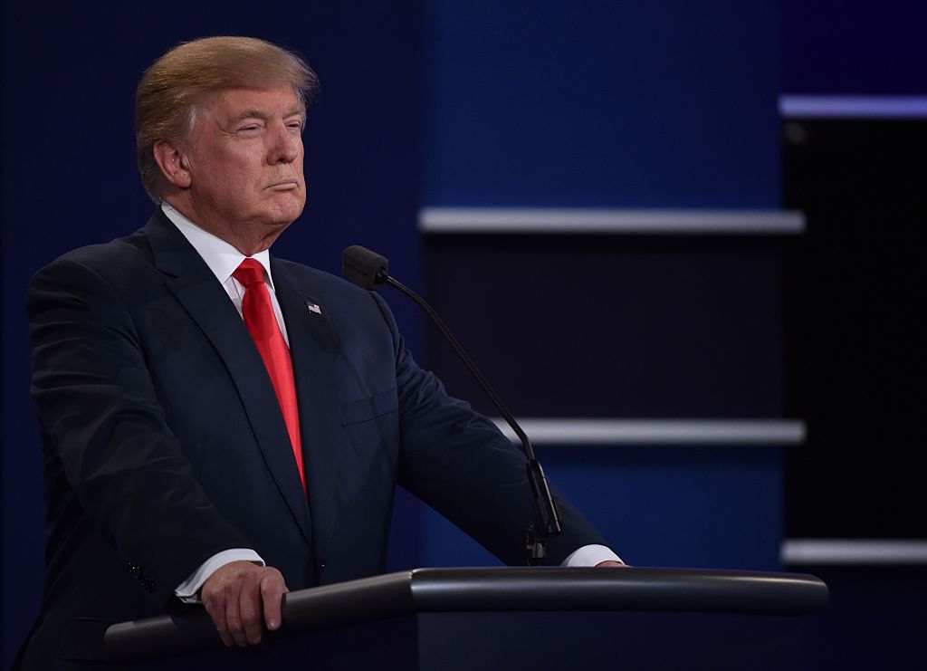 Donald Trump at a general election debate podium. (CREDIT: PAUL J. RICHARDS/AFP/Getty Images)