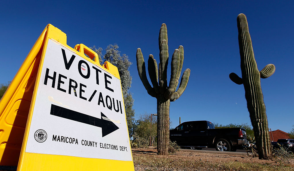 A Maricopa County Elections Department sign directs voters to a polling station (Photo by Ralph Freso/Getty Images)