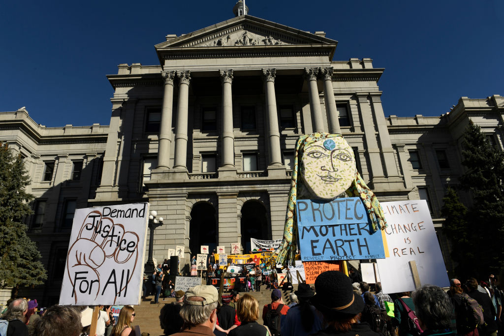 Denver youth rally at Colorado Capitol Building in support of upcoming court hearing on fracking and climate change. February 20, 2017. CREDIT: Helen Richardson/The Denver Post via Getty Images.