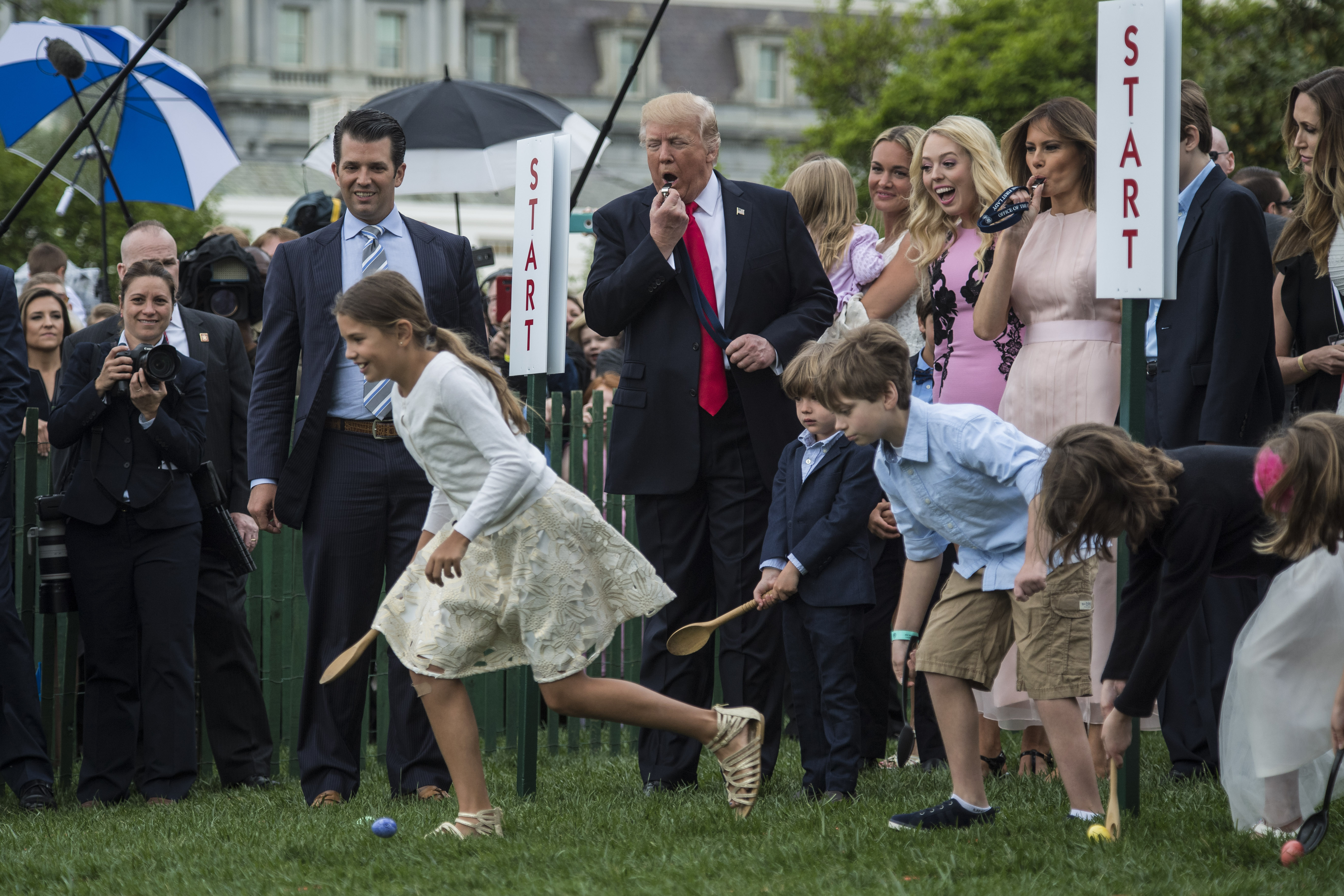 President Donald Trump and family members kick off an Easter Egg Roll race at the White House in 2017. CREDIT: Jabin Botsford/The Washington Post via Getty Images