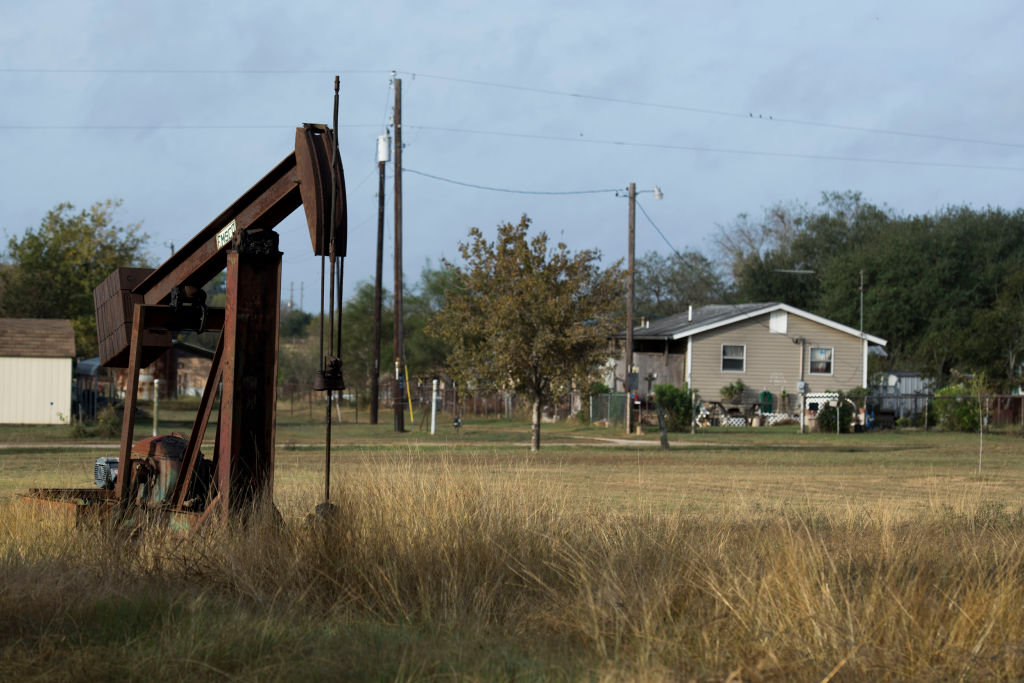 SUTHERLAND SPRINGS, TX - NOVEMBER 6:
An old oil pump jack sits on a property down the road from the First Baptist Church in Sutherland Springs, Texas on November 6, 2017. CREDIT: Carolyn Van Houten/The Washington Post via Getty Images