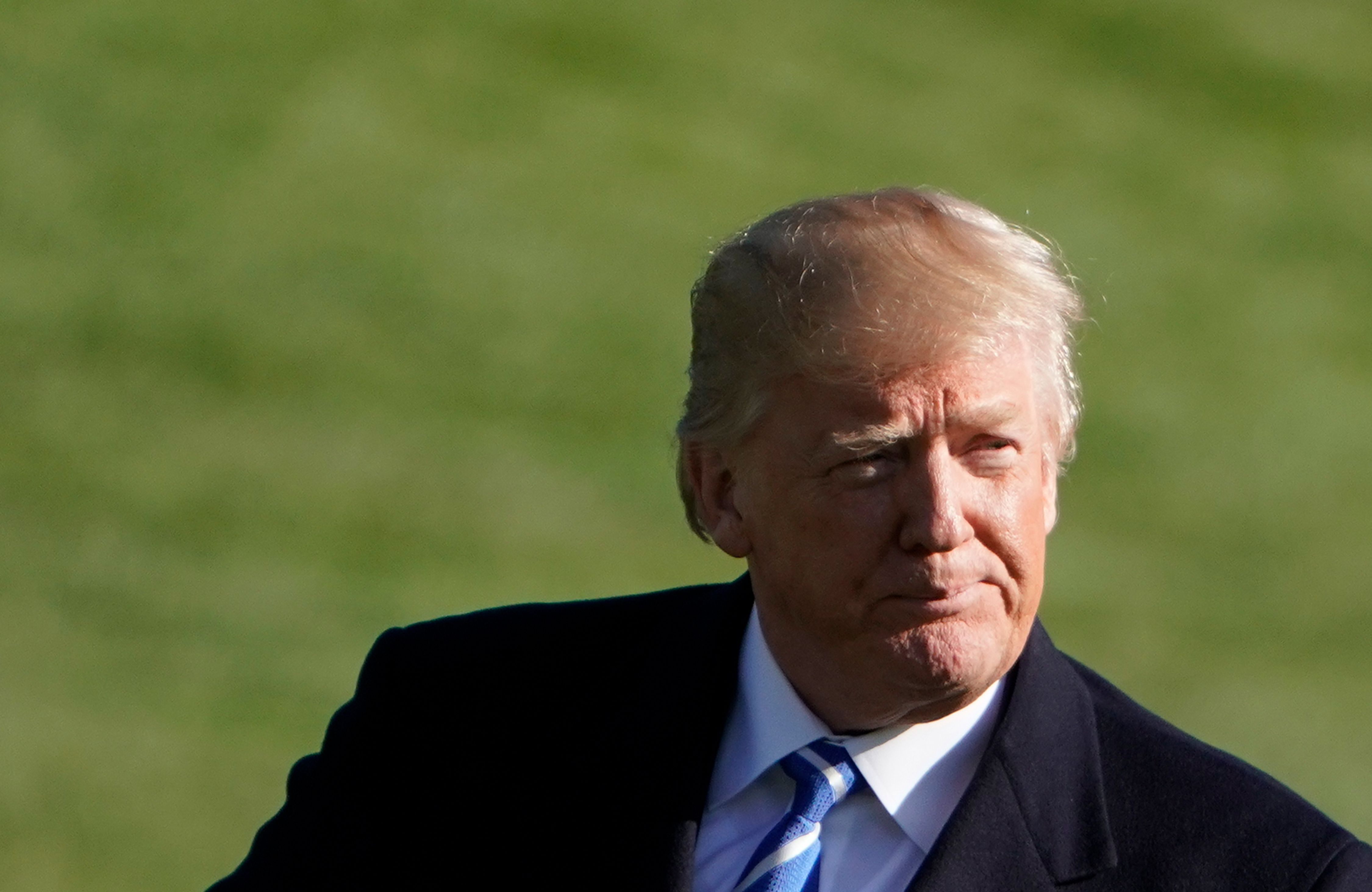 US President Donald Trump makes his way across the South Lawn upon returning to the White House on April 5, 2018 in Washington, DC.
(CREDIT: MANDEL NGAN/AFP/Getty Images)