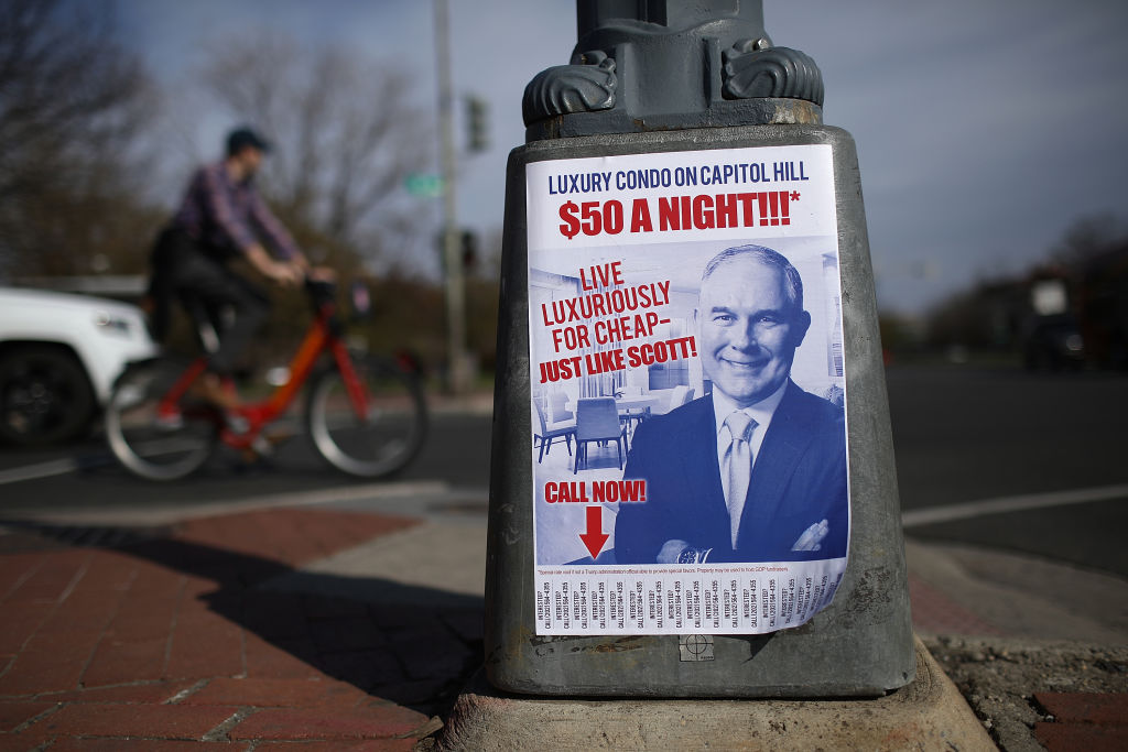 Fliers posted around Capitol Hill poke fun at EPA Administrator Scott Pruitt on April 6, 2018 in Washington, DC. CREDIT: Win McNamee/Getty Images