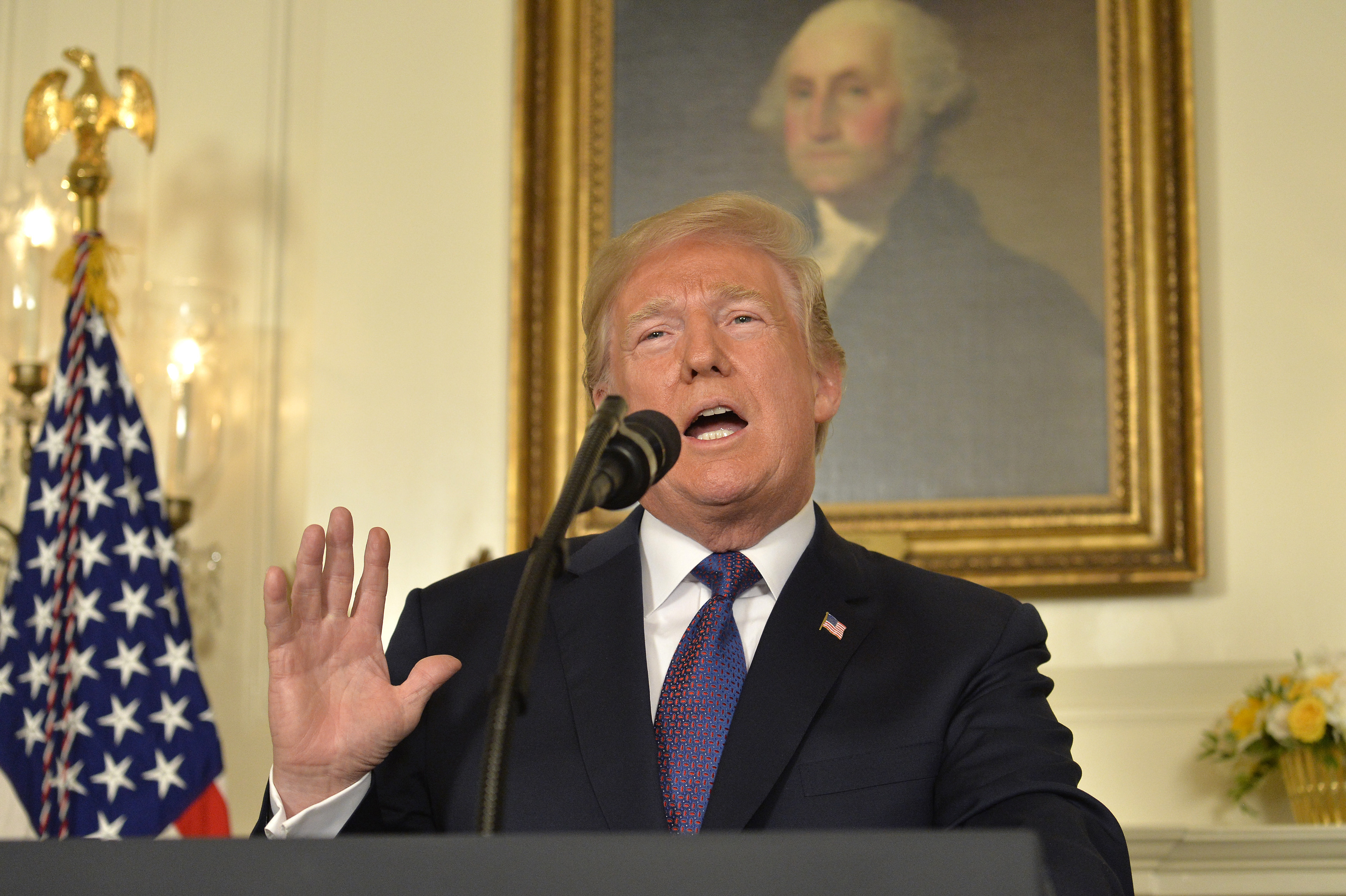 WASHINGTON, DC - APRIL 13: U.S. President Donald Trump makes remarks as he speaks to the nation, announcing military action against Syria for the recent apparent gas attack on its civilians, at the White House, on April 13, 2018, in Washington, DC. President Trump announced that a joint operation of "precision strikes" is underway in Syria with armed forces from the United Kingdom and France. (Photo by Mike Theiler - Pool/Getty Images)
