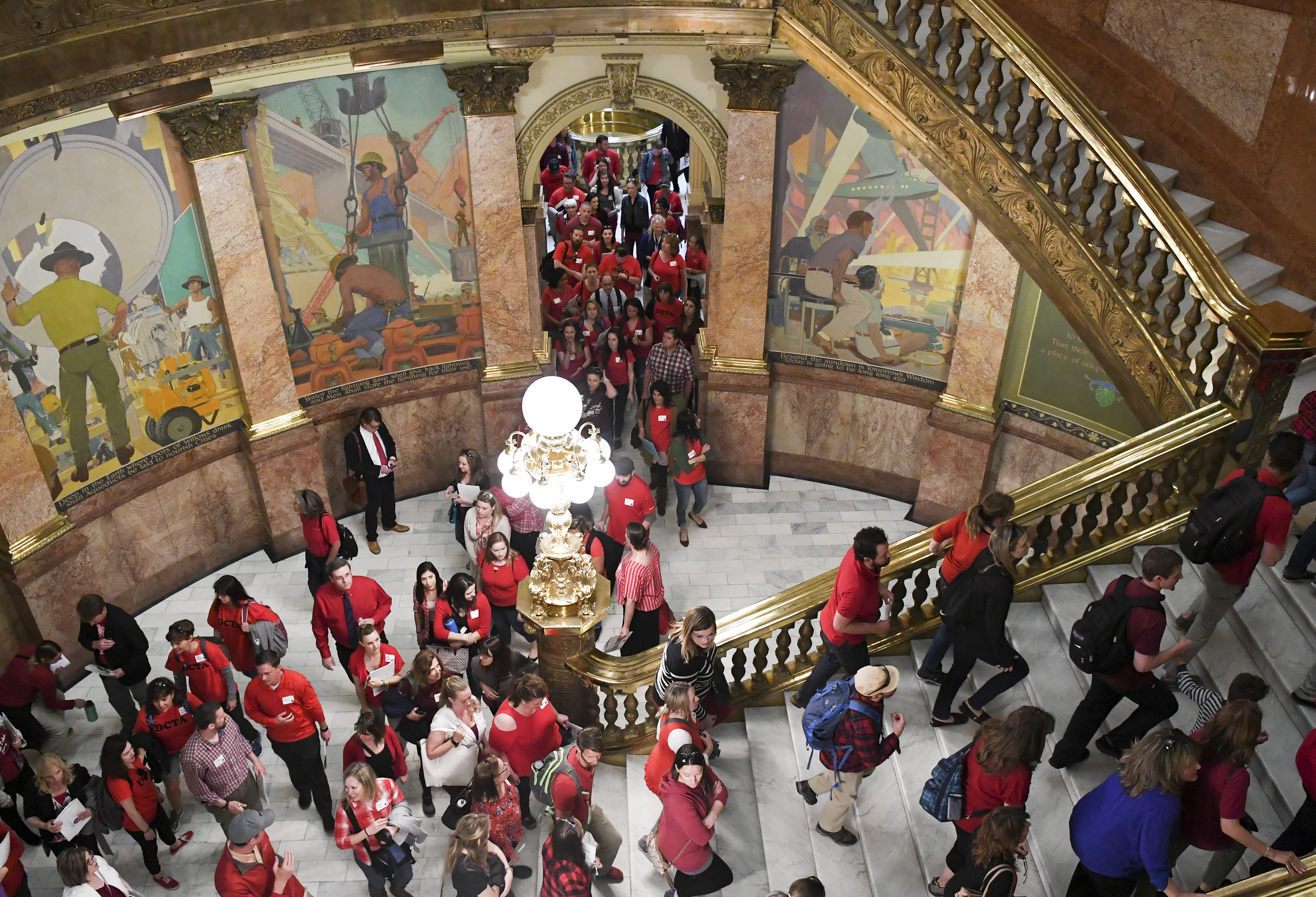Colorado educators file into the Colorado State Capitol to meet with legislators to call for increased education funding on April 16, 2018 in Denver, Colorado. (Credit: RJ Sangosti/The Denver Post via Getty Images)