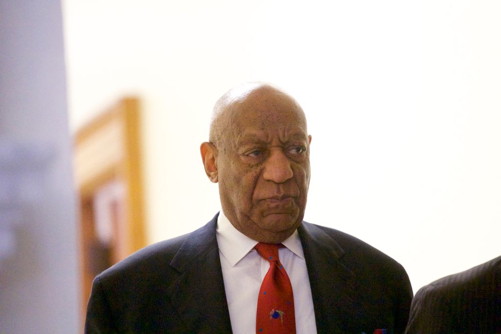 NORRISTOWN, PA - APRIL 26: Bill Cosby walks after it was announced a verdict is in at the Montgomery County Courthouse for day fourteen of his sexual assault retrial on April 26, 2018 in Norristown, Pennsylvania. CREDIT: Mark Makela/Getty Images