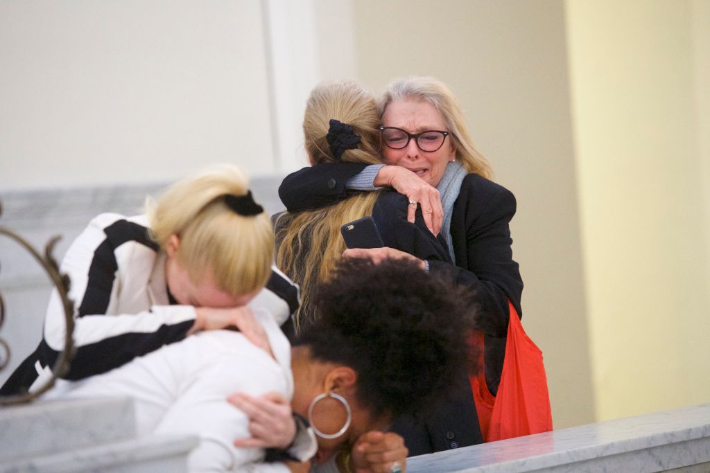 NORRISTOWN, PA - APRIL 26: Bill Cosby accusers Victoria Valentino, Lili Bernard, and Therese Serignese react after the guilty on all counts verdict was delivered in the sexual assault retrial at the Montgomery County Courthouse on April 26, 2018 in Norristown, Pennsylvania. CREDIT: Mark Makela/Getty Images
