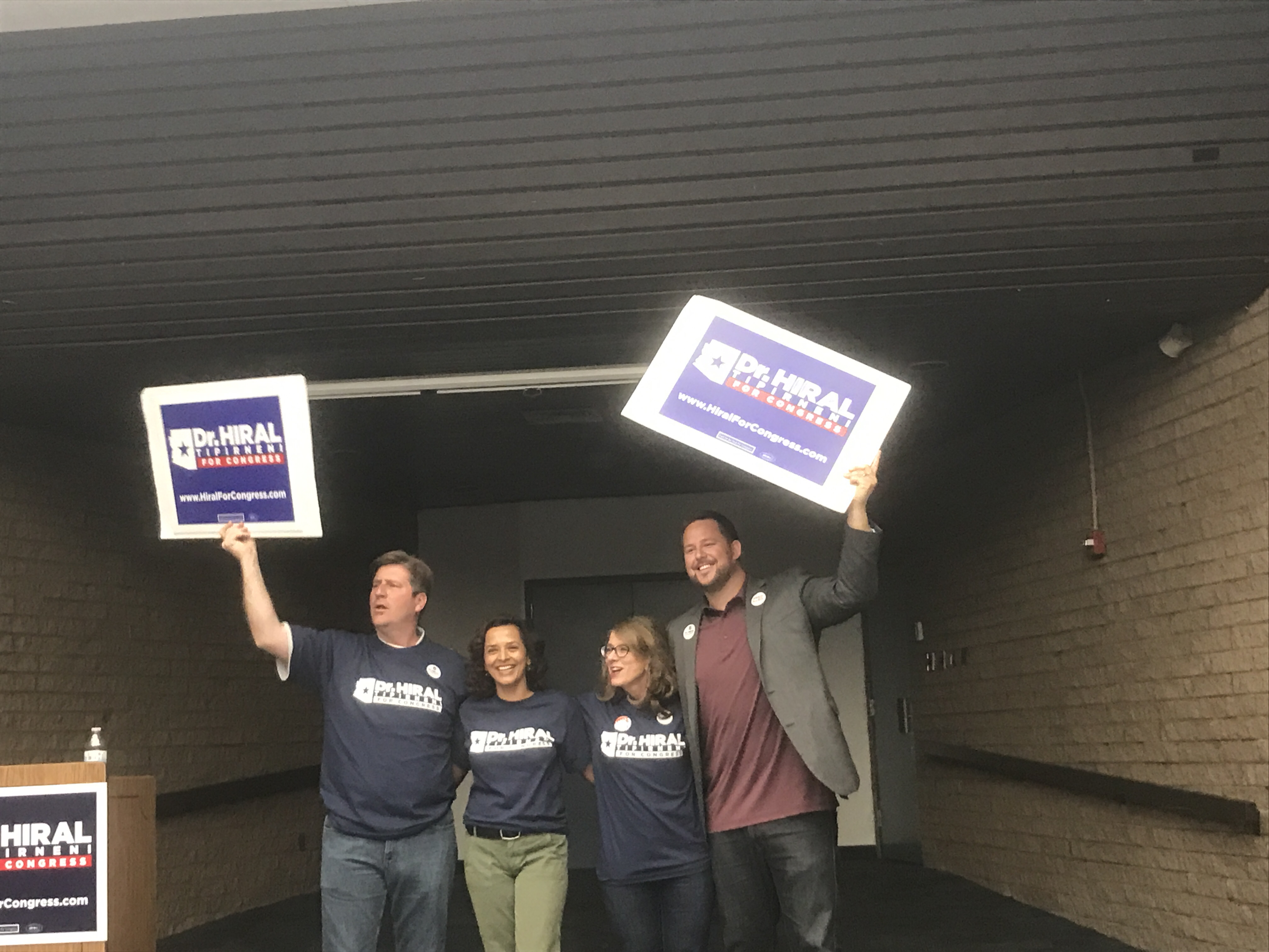 Tipirneni (second from left) with supporters Saturday. CREDIT: Addy Baird