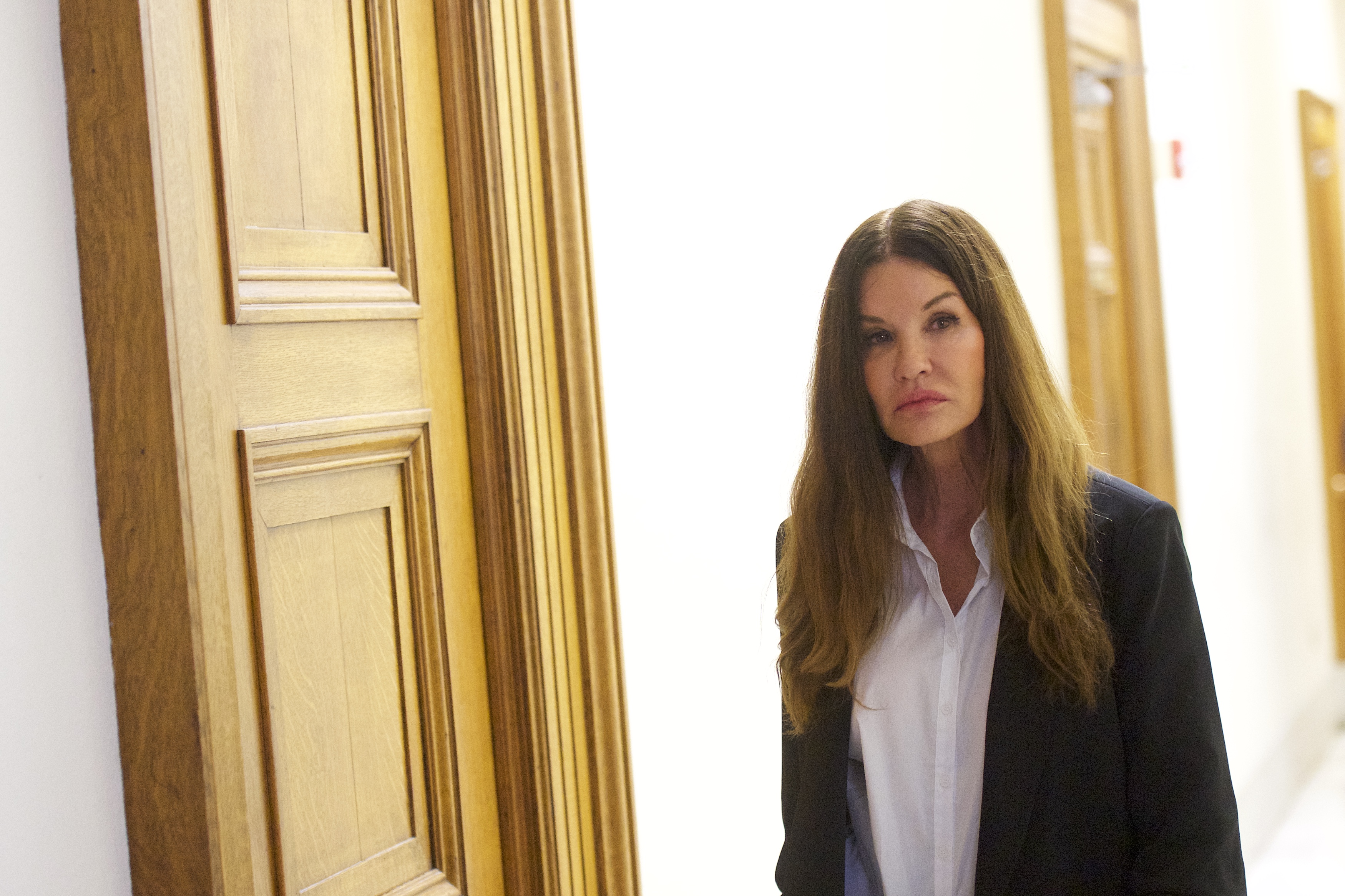 NORRISTOWN, PA - APRIL 12: Bill Cosby accuser model Janice Dickinson, 63, walks through the Montgomery County Courthouse in a break from testifying on the fourth day of the sexual assault retrial on April 12, 2018 in Norristown, Pennsylvania. (Photo by Mark Makela/Getty Images)