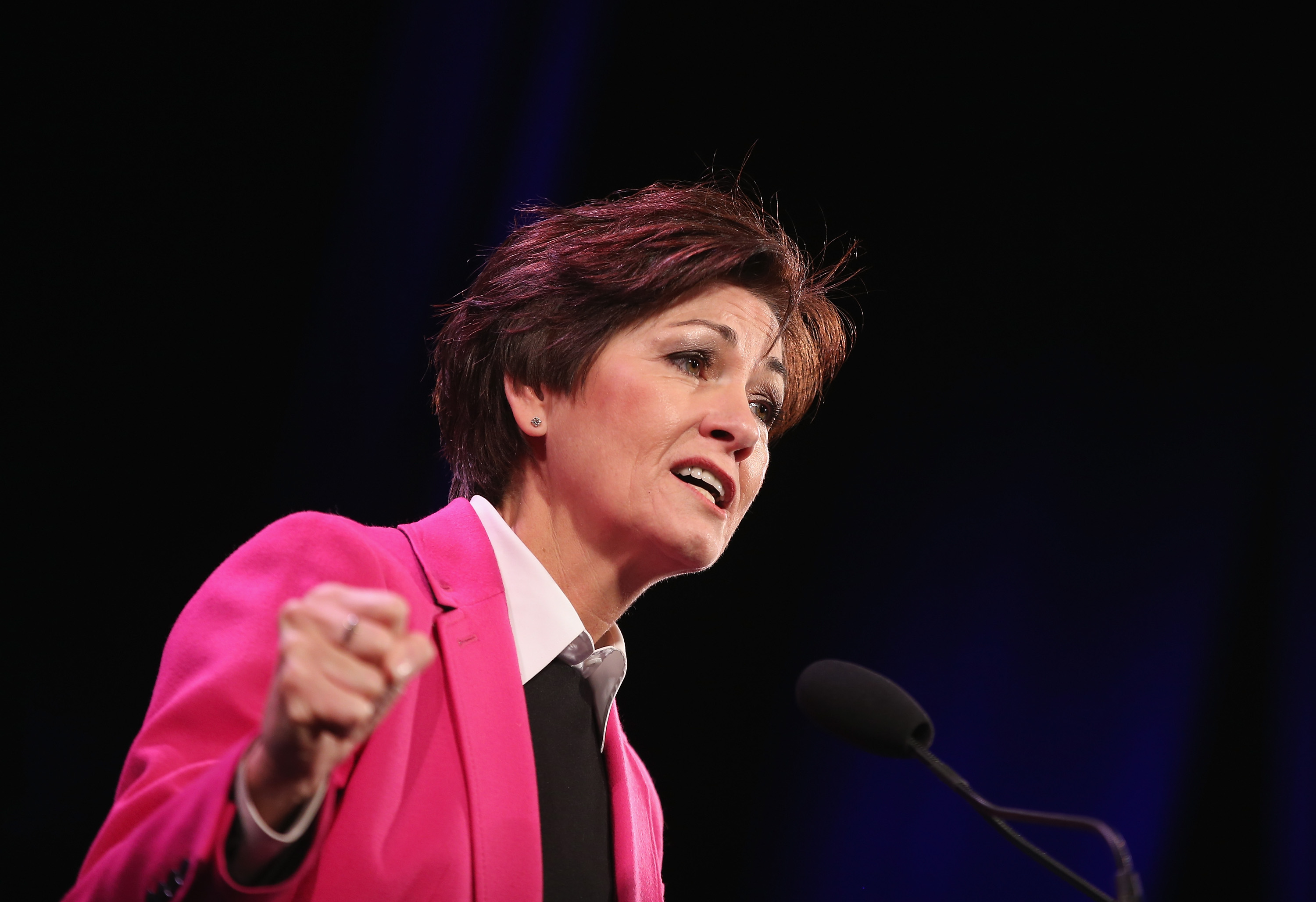 DES MOINES, IA - JANUARY 24: Iowa Lt. Gov. Kim Reynolds speaks to guests at the Iowa Freedom Summit on January 24, 2015 in Des Moines, Iowa. The summit is hosting a group of potential 2016 Republican presidential candidates to discuss core conservative principles ahead of the January 2016 Iowa Caucuses. (Photo by Scott Olson/Getty Images)
