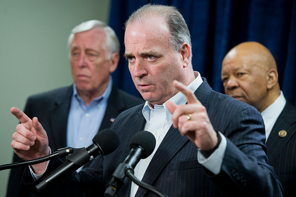 Reps. Dan Kildee, D-Mich., center, Elijah Cummings, D-Md., right, and House Minority Whip Steny Hoyer, D-Md., attend a news conference in Flint, Mich., on the city's water crisis. (Credit: Getty Images/Tom Williams/CQ Roll Call)