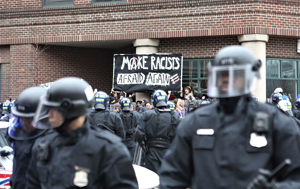Police coral marchers on Inauguration Day 2017 in Washington, D.C. (CREDIT: Emily Molli/NurPhoto via Getty Images)