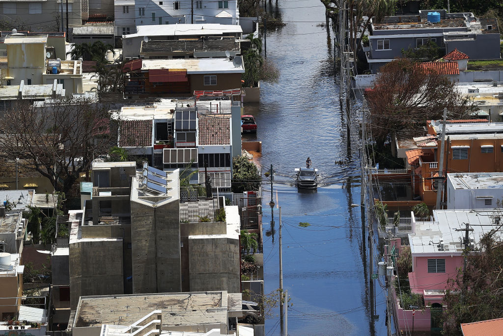 A flooded street in San Juan, Puerto Rico, after Hurricane Maria hit the U.S. island in September. CREDIT: Joe Raedle/Getty Images