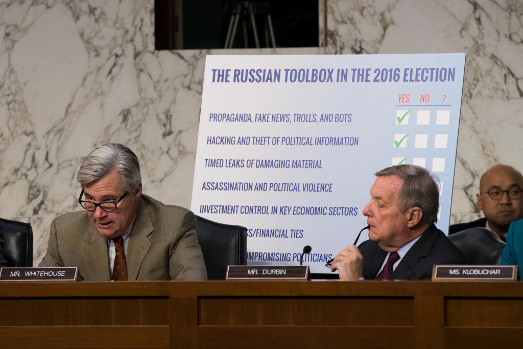 FILE PICTURE: (L to R) Subcommittee ranking member Sen. Sheldon Whitehouse (D-RI) speaks as Sen. Dick Durbin (D-IL) looks on during a Senate Judiciary Subcommittee on Crime and Terrorism hearing titled 'Extremist Content and Russian Disinformation Online' on Capitol Hill, October 31, 2017 in Washington, DC. (Drew Angerer/Getty Images)