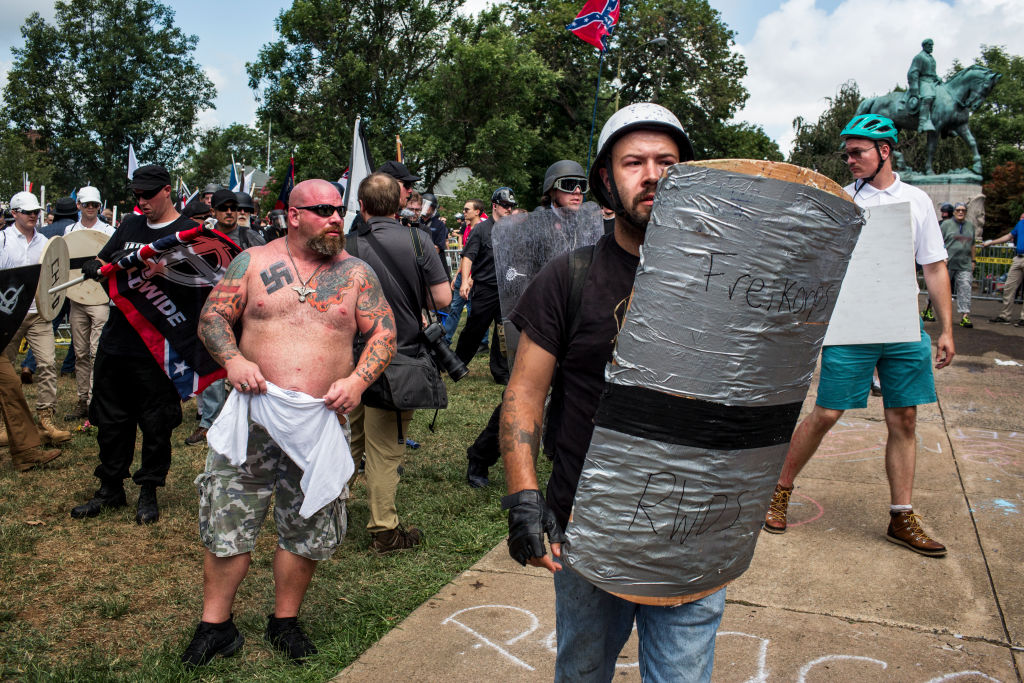 White supremacists have just seen another member found guilty for actions in Charlottesville. CREDIT: GETTY / JASON ANDREW